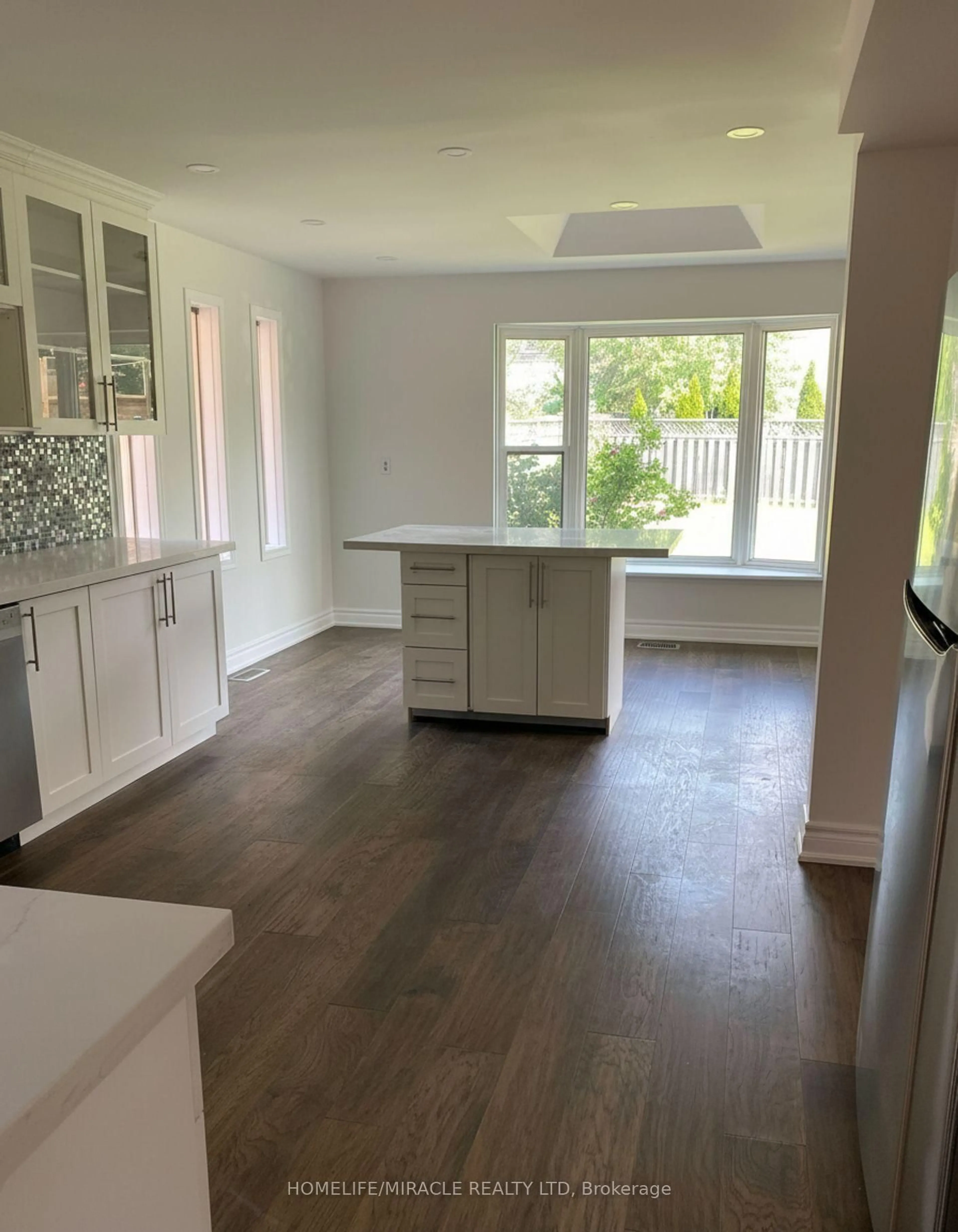 Open concept kitchen, wood/laminate floor for 2 Edinborough Lane, Clarington Ontario L1E 1E8