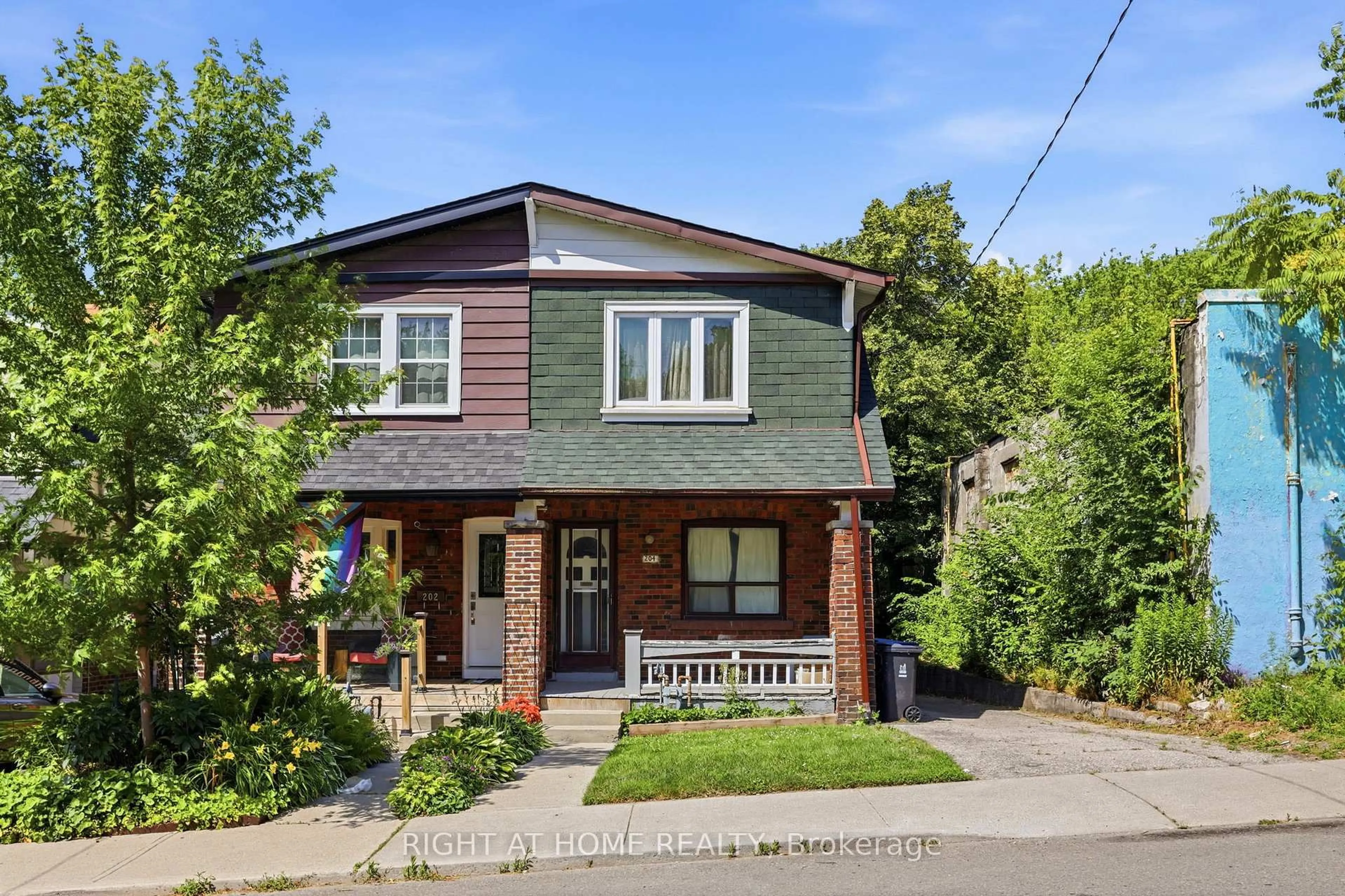 Home with brick exterior material, street for 204 Highfield Rd, Toronto Ontario M4L 2V3