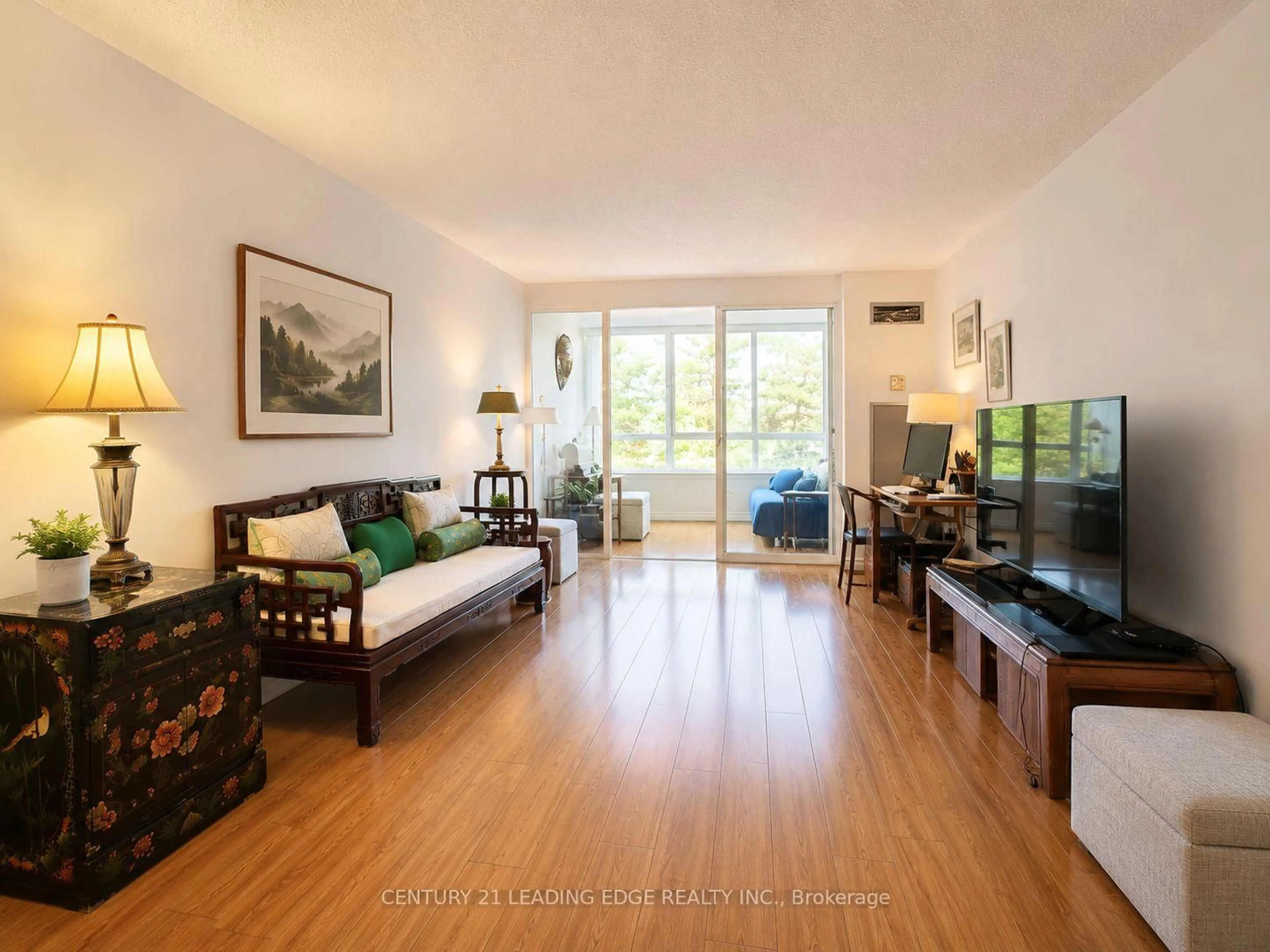 Living room with furniture, wood/laminate floor for 275 Bamburgh Circ #310, Toronto Ontario M1W 3X4