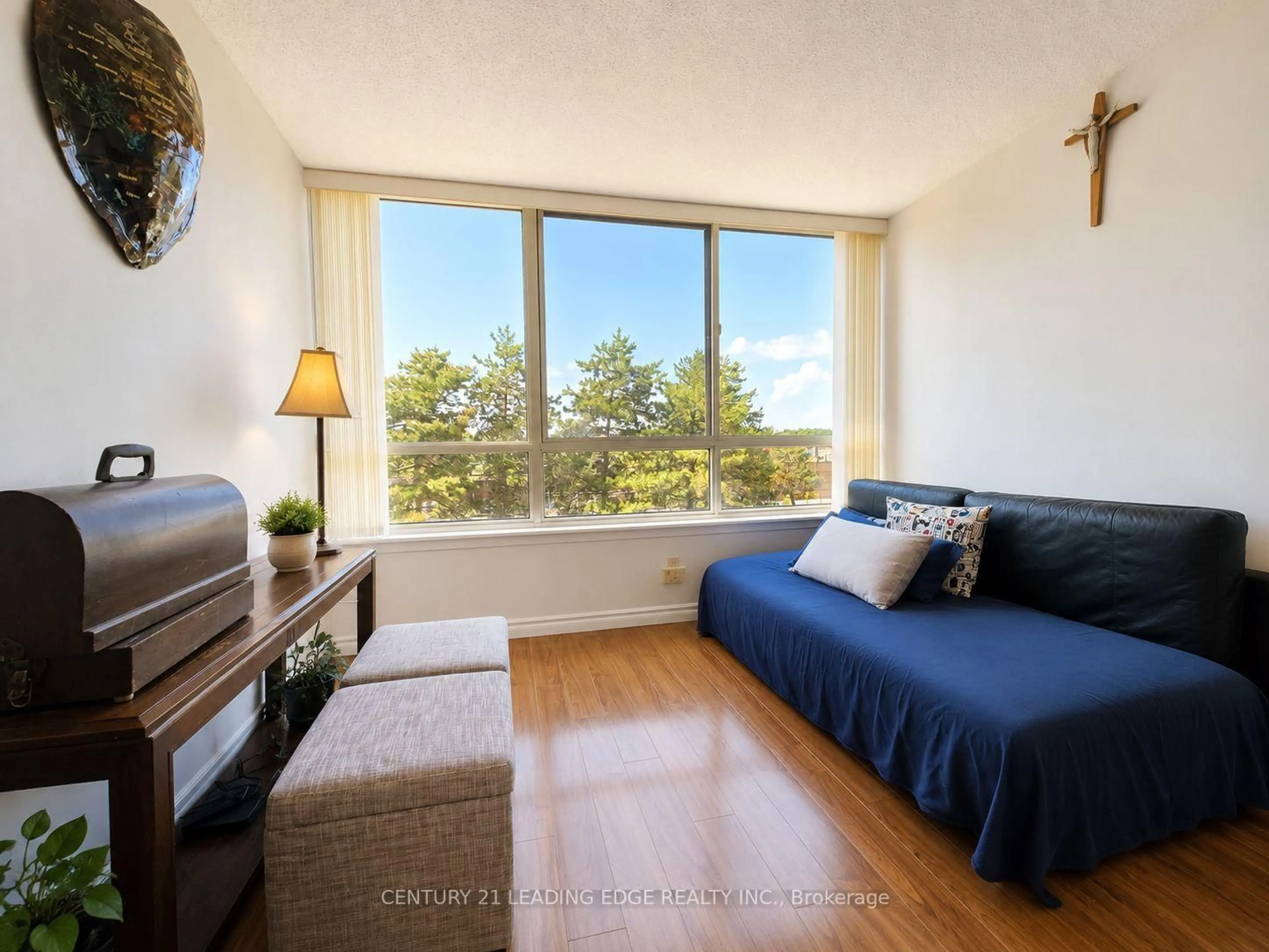 Living room with furniture, wood/laminate floor for 275 Bamburgh Circ #310, Toronto Ontario M1W 3X4