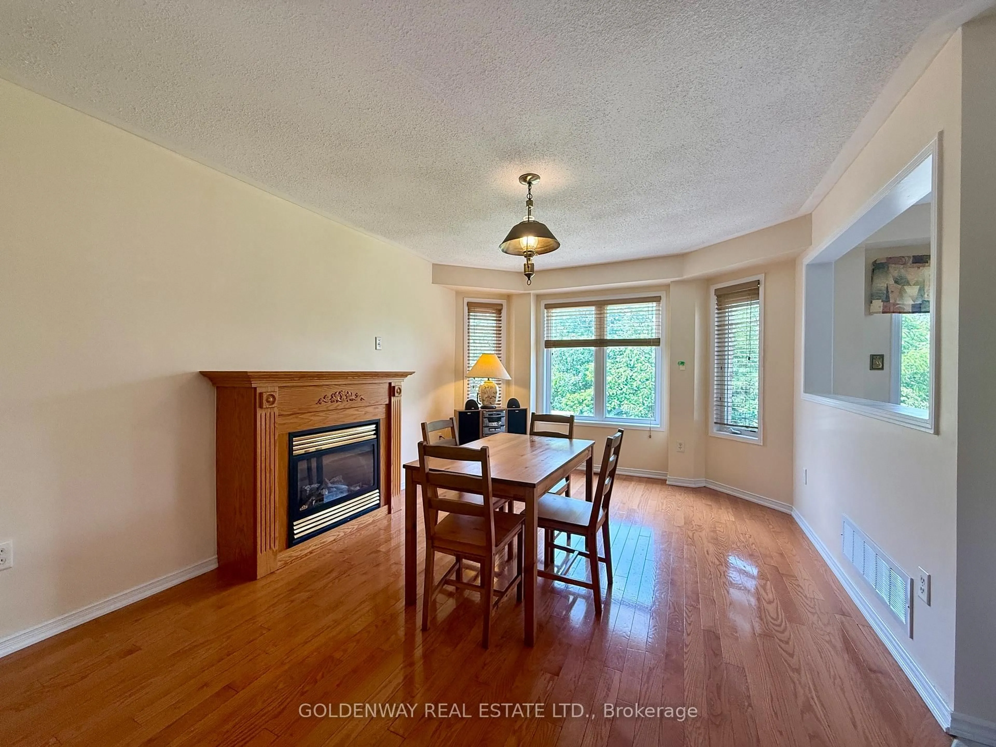 Dining room, wood/laminate floor for 20 Green Ash Terr, Toronto Ontario M1E 5J3