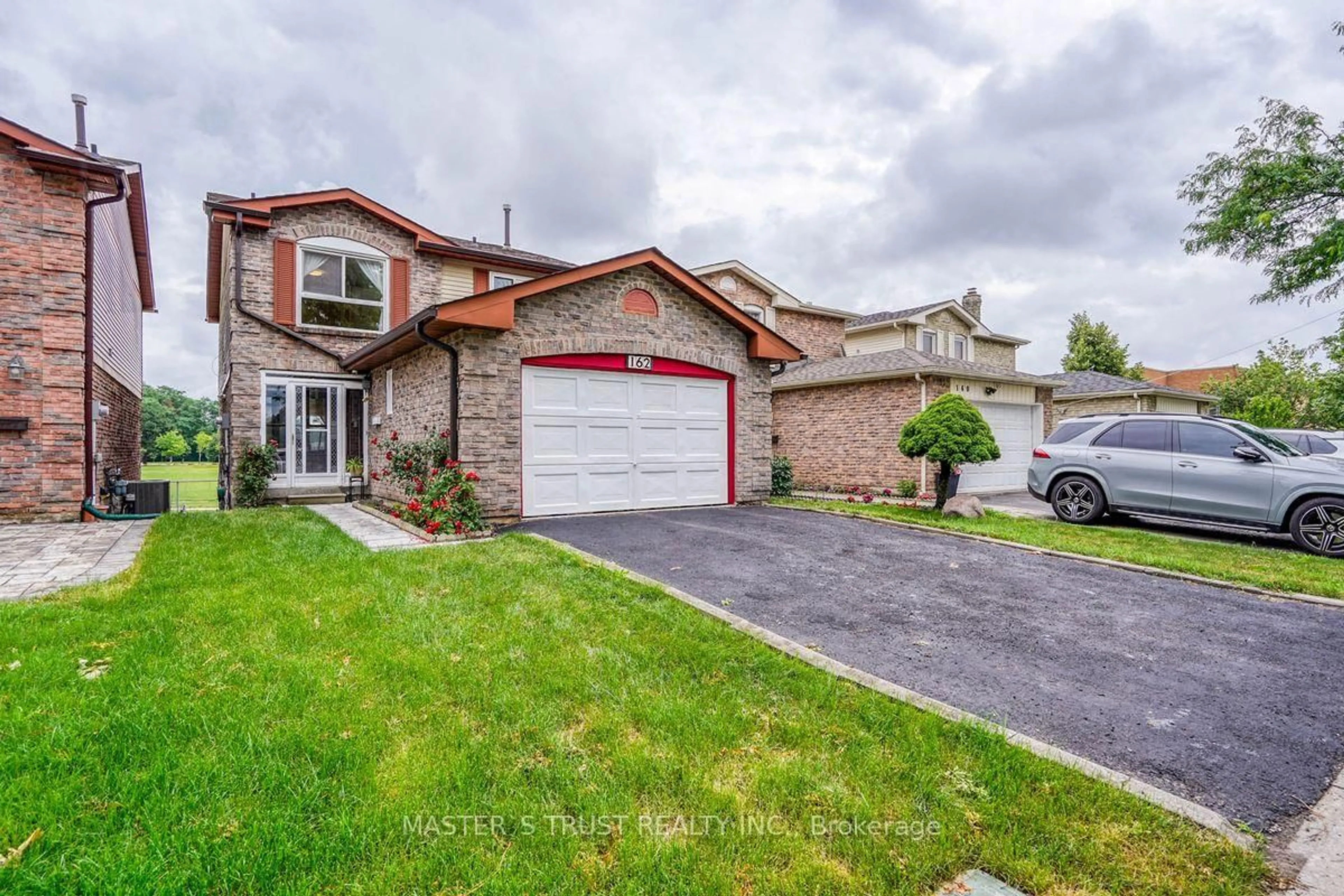 Home with brick exterior material, street for 162 Fundy Bay Blvd, Toronto Ontario M1W 3G1