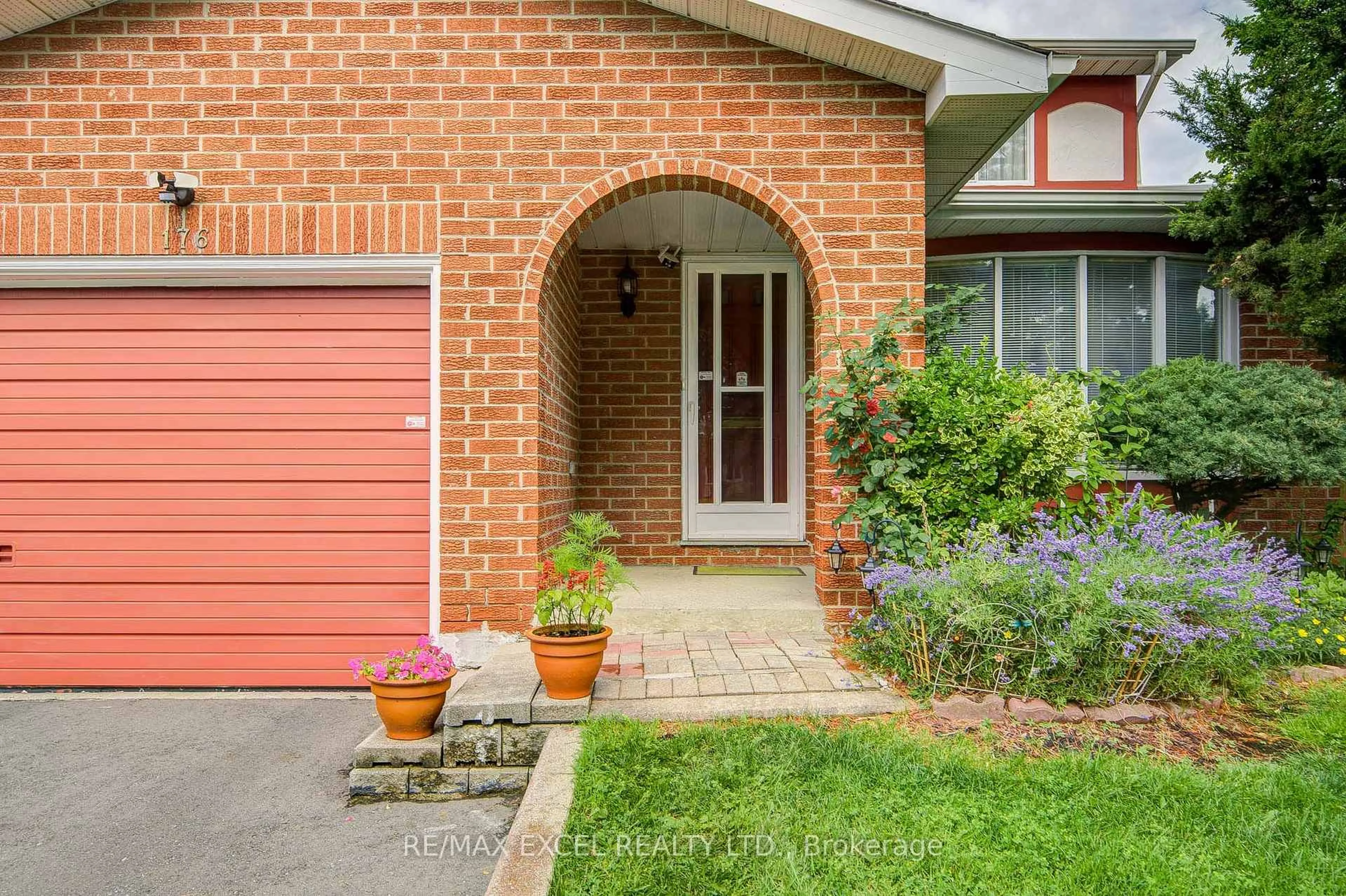 Home with brick exterior material, street for 176 Goldhawk Tr, Toronto Ontario M1V 1X2