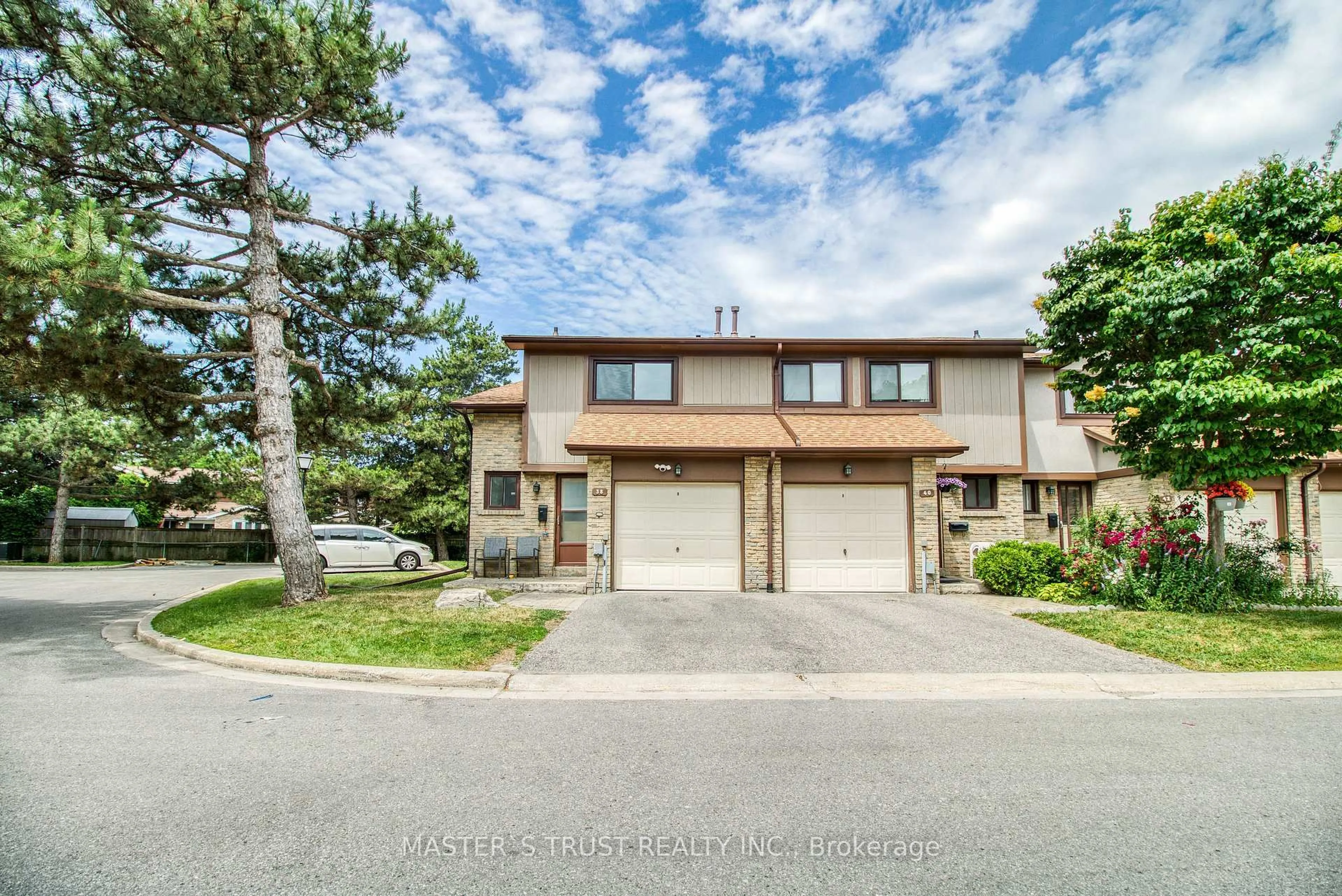 A pic from outside/outdoor area/front of a property/back of a property/a pic from drone, water/lake/river/ocean view for 24 Fundy Bay Blvd ##38, Toronto Ontario M1W 3A4