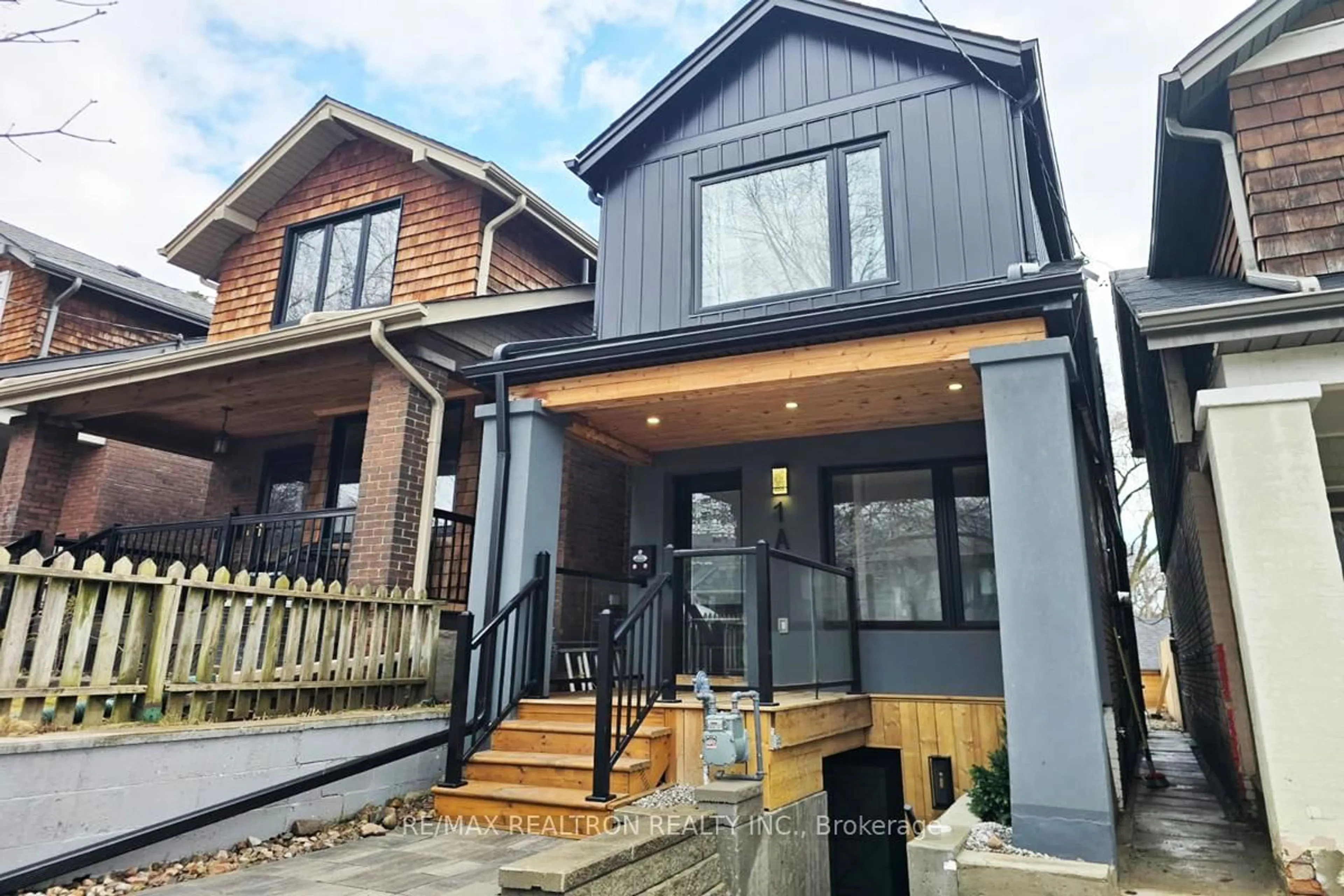 Home with brick exterior material, street for 1A Normandy Blvd, Toronto Ontario M4L 3K1