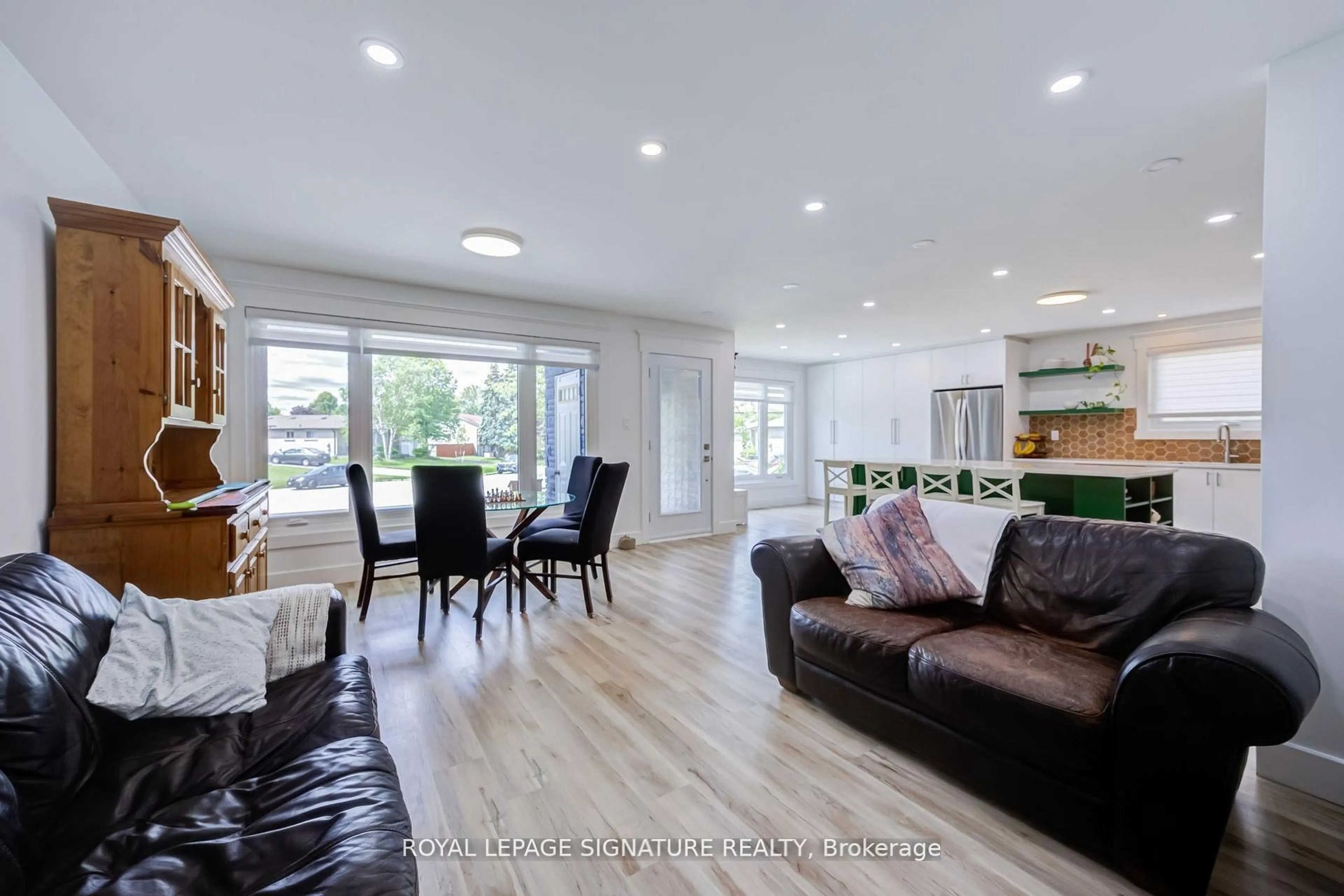 Living room with furniture, wood/laminate floor for 12 Kinnison Crt, Ajax Ontario L1S 1K5