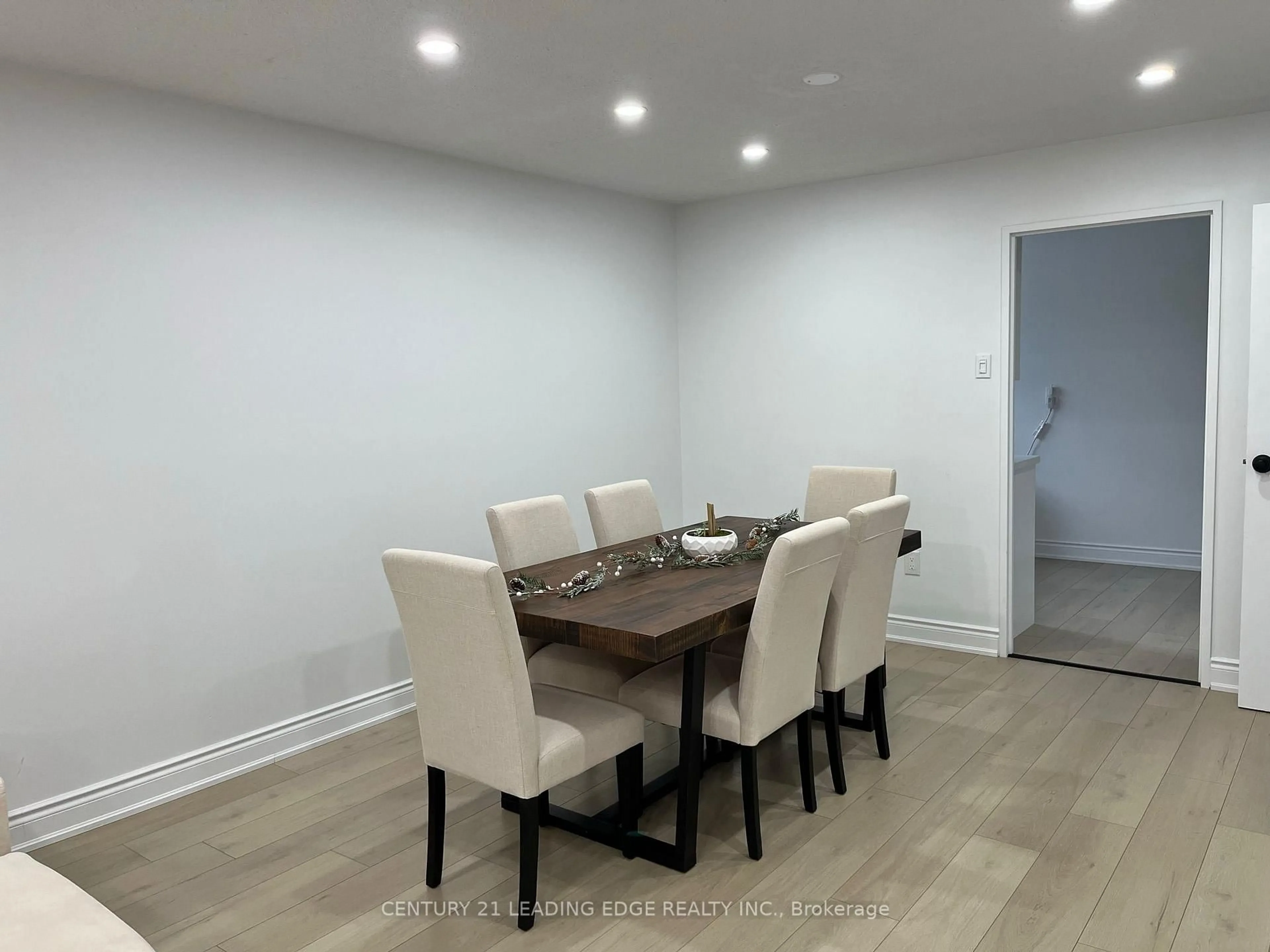 Dining room, wood/laminate floor for 91 Muir Dr #26, Toronto Ontario M1M 3T7
