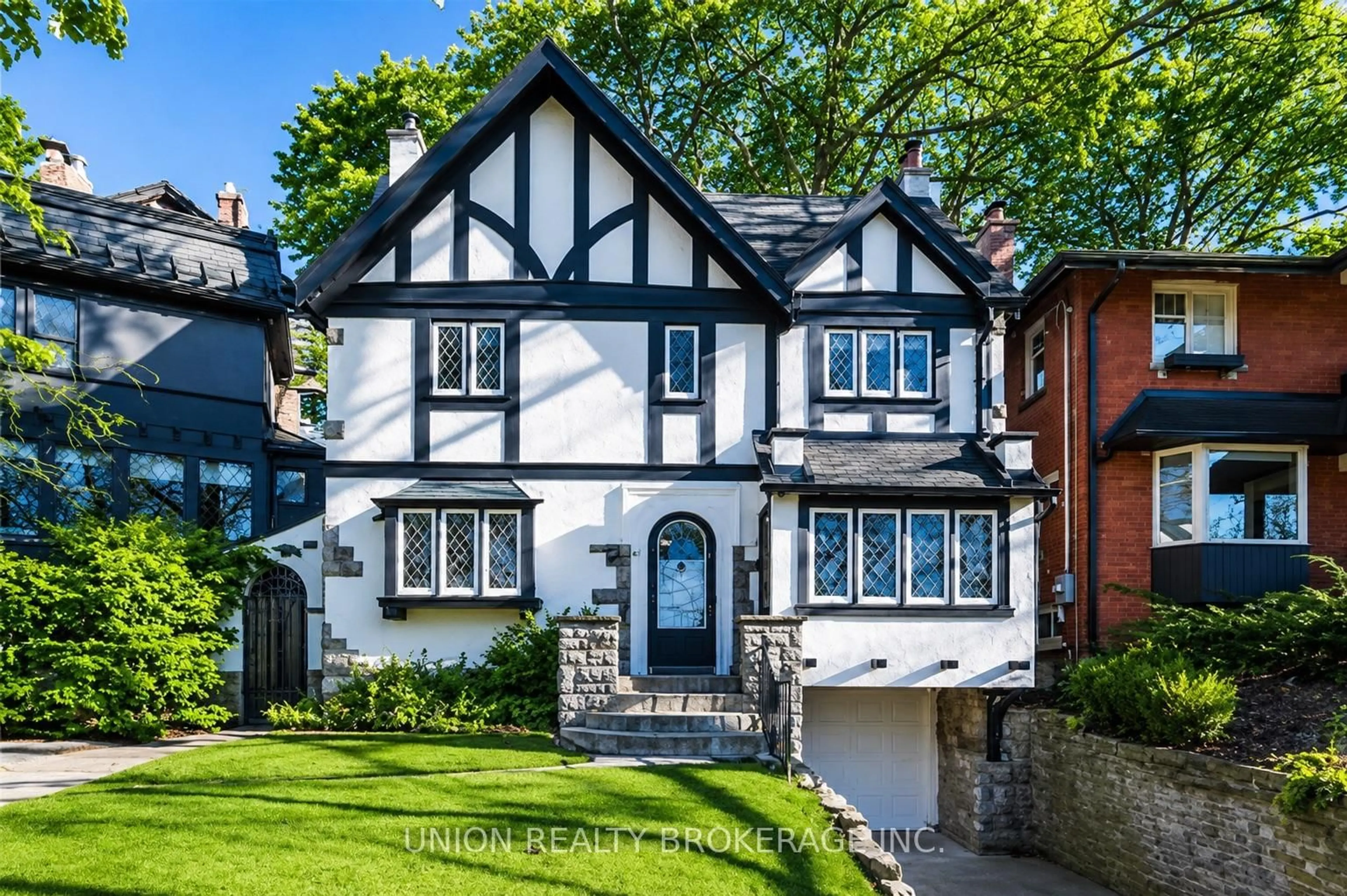 Home with brick exterior material, street for 51 Pine Cres, Toronto Ontario M4E 1L3