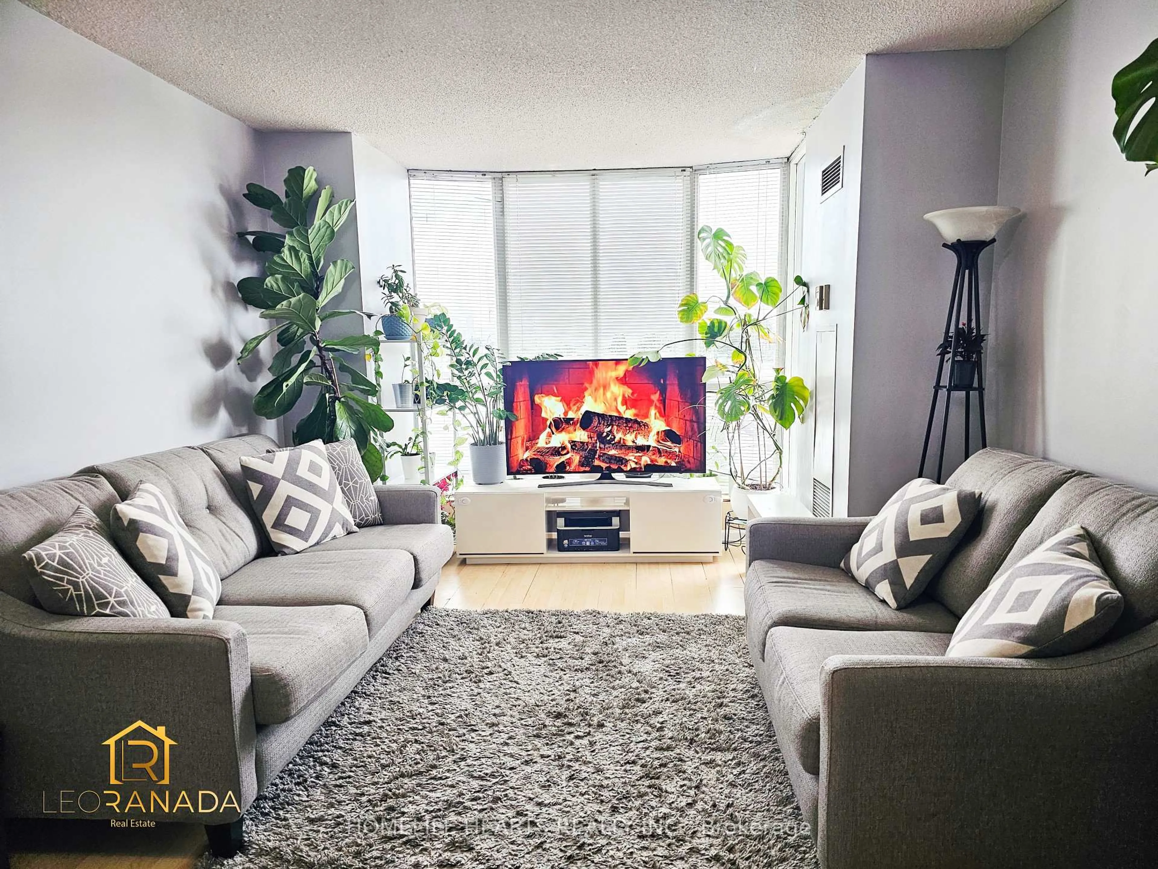 Living room with furniture, carpet floor for 1470 Midland Ave #309, Toronto Ontario M1P 4Z4