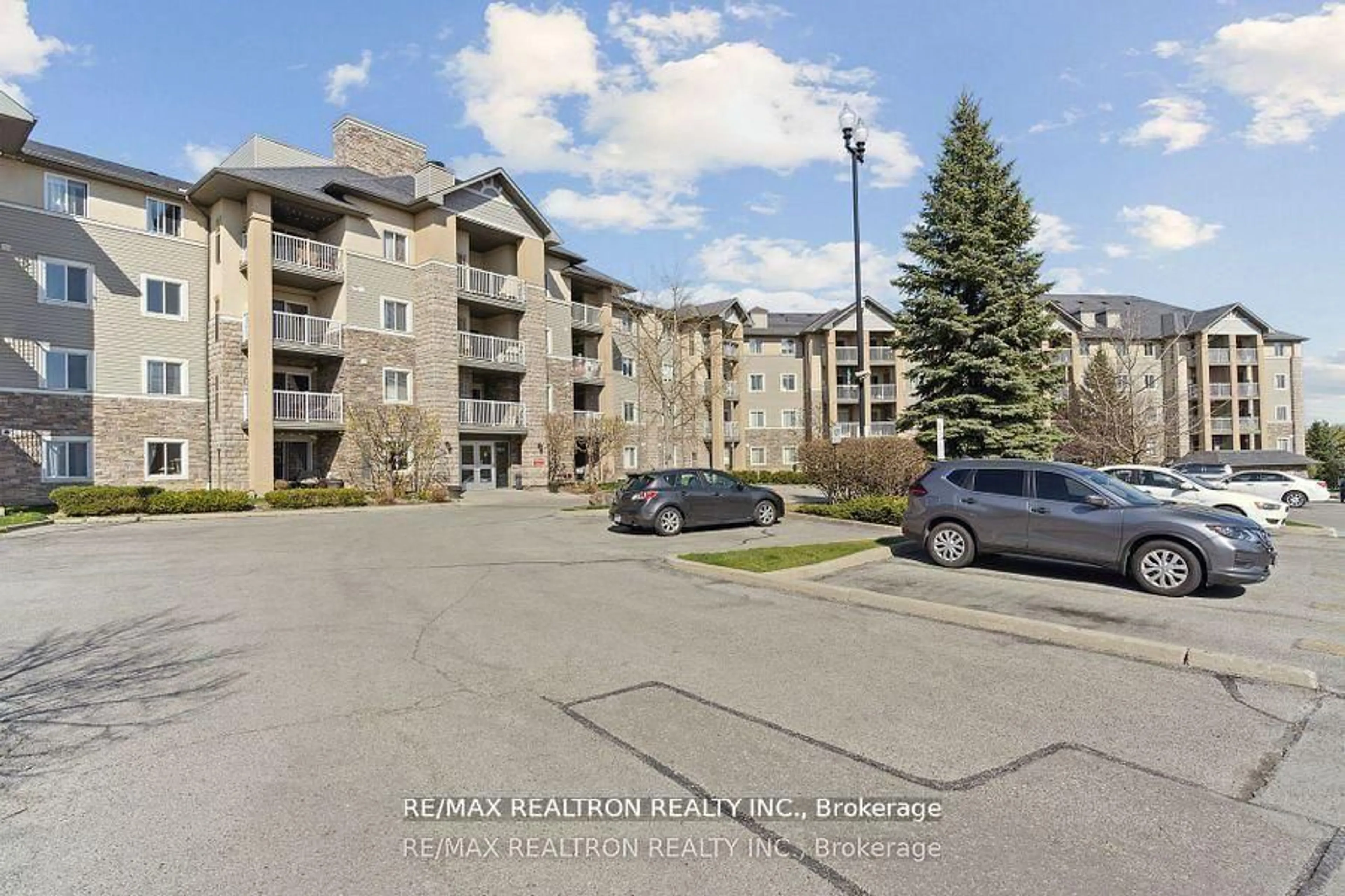 A pic from outside/outdoor area/front of a property/back of a property/a pic from drone, mountain view for 684 Warden Ave #103, Toronto Ontario M1L 4W4