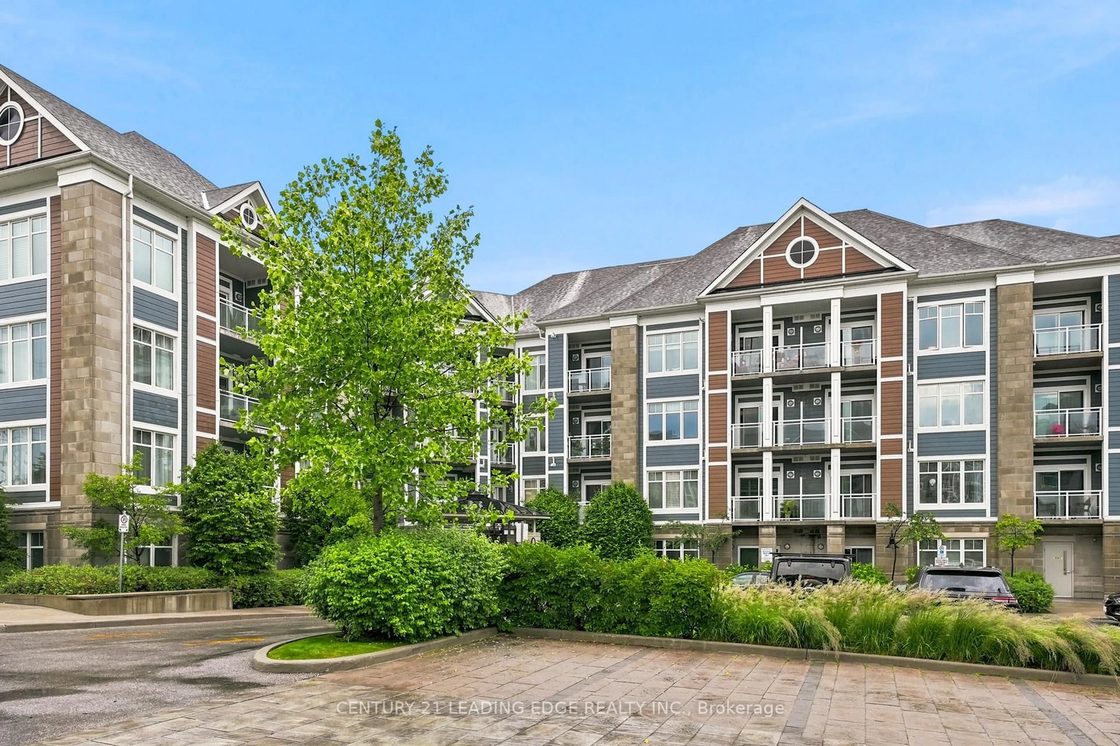 A pic from outside/outdoor area/front of a property/back of a property/a pic from drone, unknown for 680 Gordon St #103, Whitby Ontario L1N 0L2