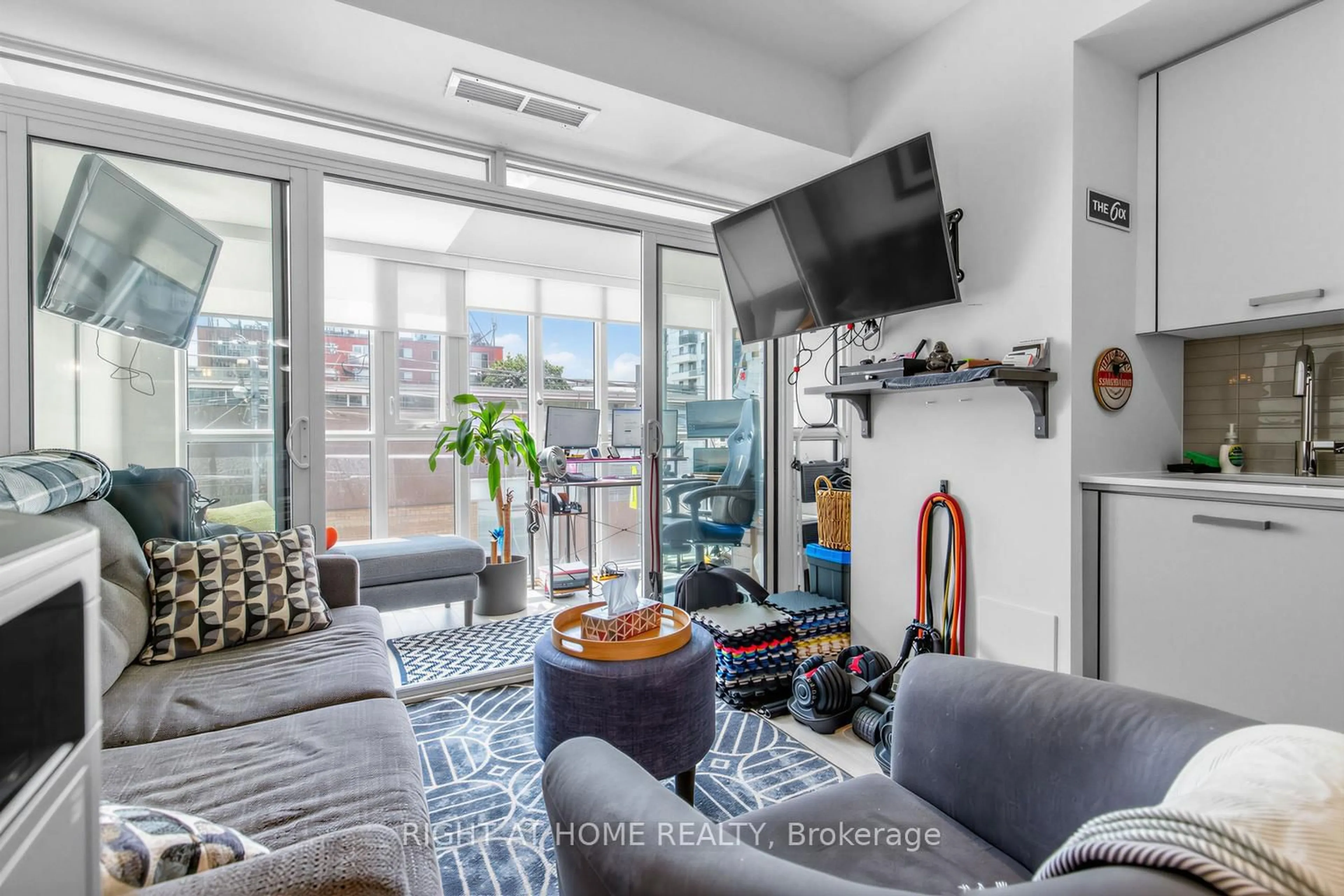 Living room with furniture, unknown for 1630 Queen St #211, Toronto Ontario M4L 0B3