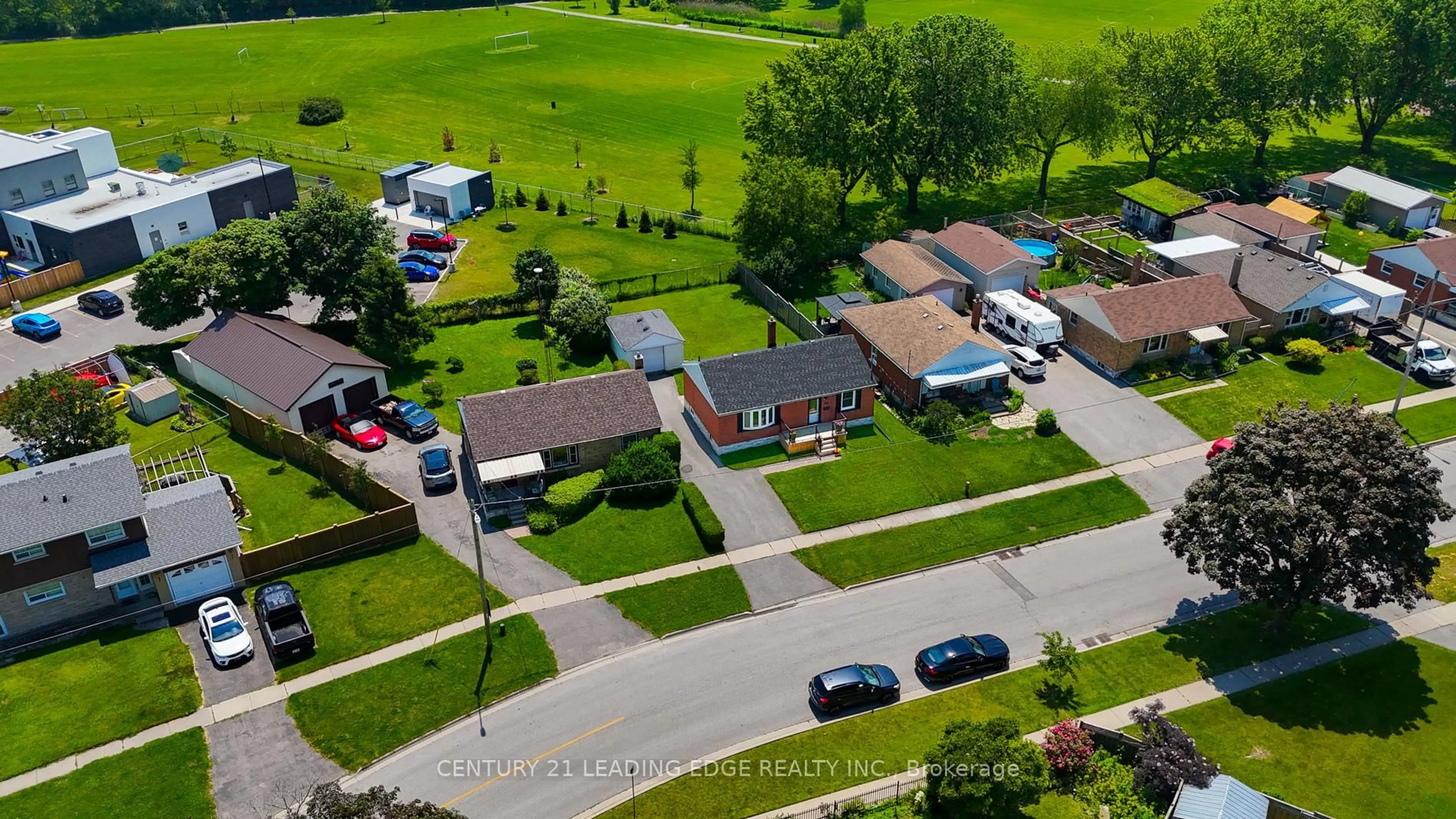 A pic from outside/outdoor area/front of a property/back of a property/a pic from drone, street for 23 Kawartha Ave, Oshawa Ontario L1H 3Y7