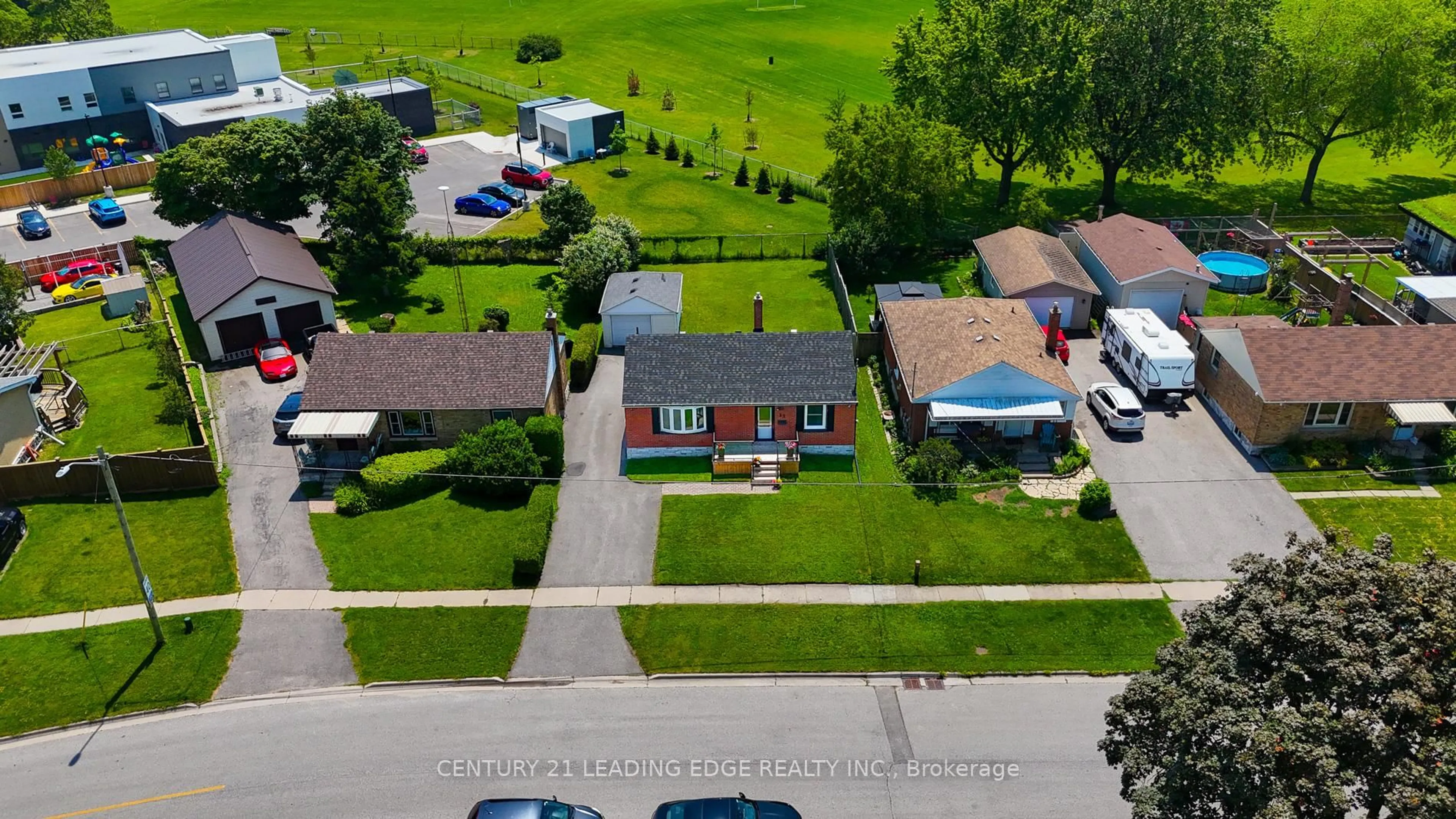 A pic from outside/outdoor area/front of a property/back of a property/a pic from drone, street for 23 Kawartha Ave, Oshawa Ontario L1H 3Y7