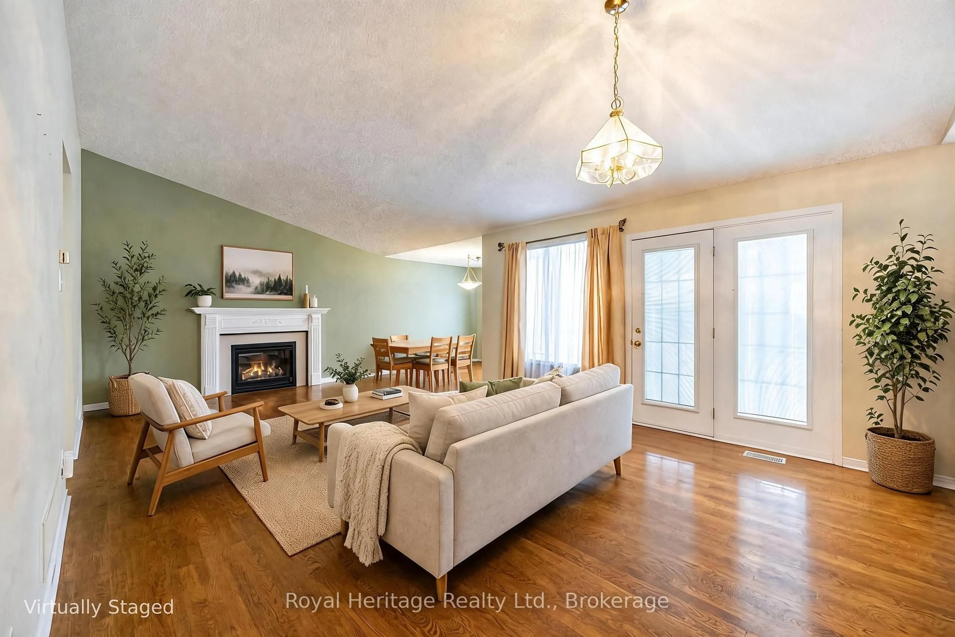 Living room with furniture, wood/laminate floor for 118 Bluffs Rd, Clarington Ontario L1B 1A8