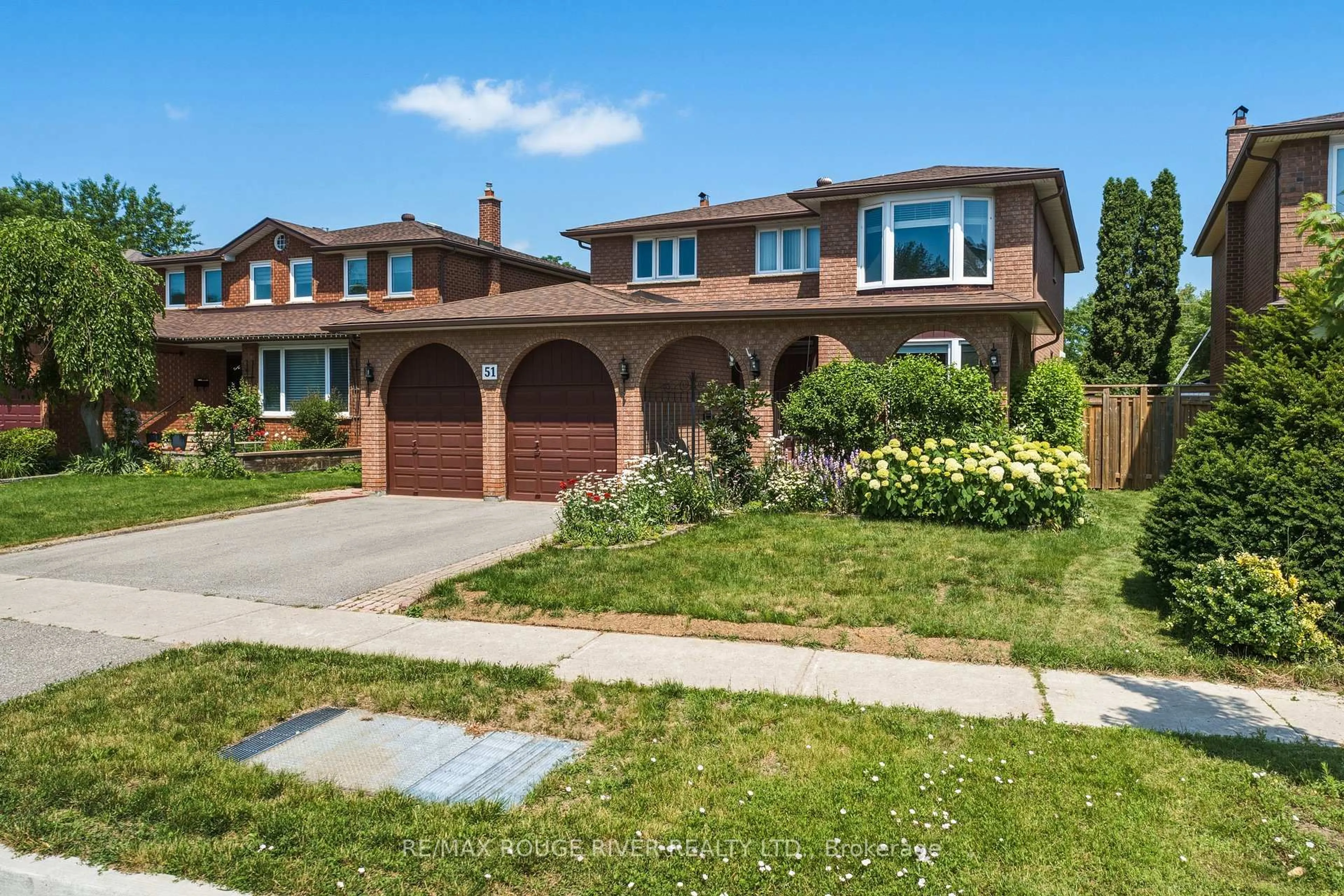 Home with brick exterior material, street for 51 Sugarbush Sq, Toronto Ontario M1C 3M6