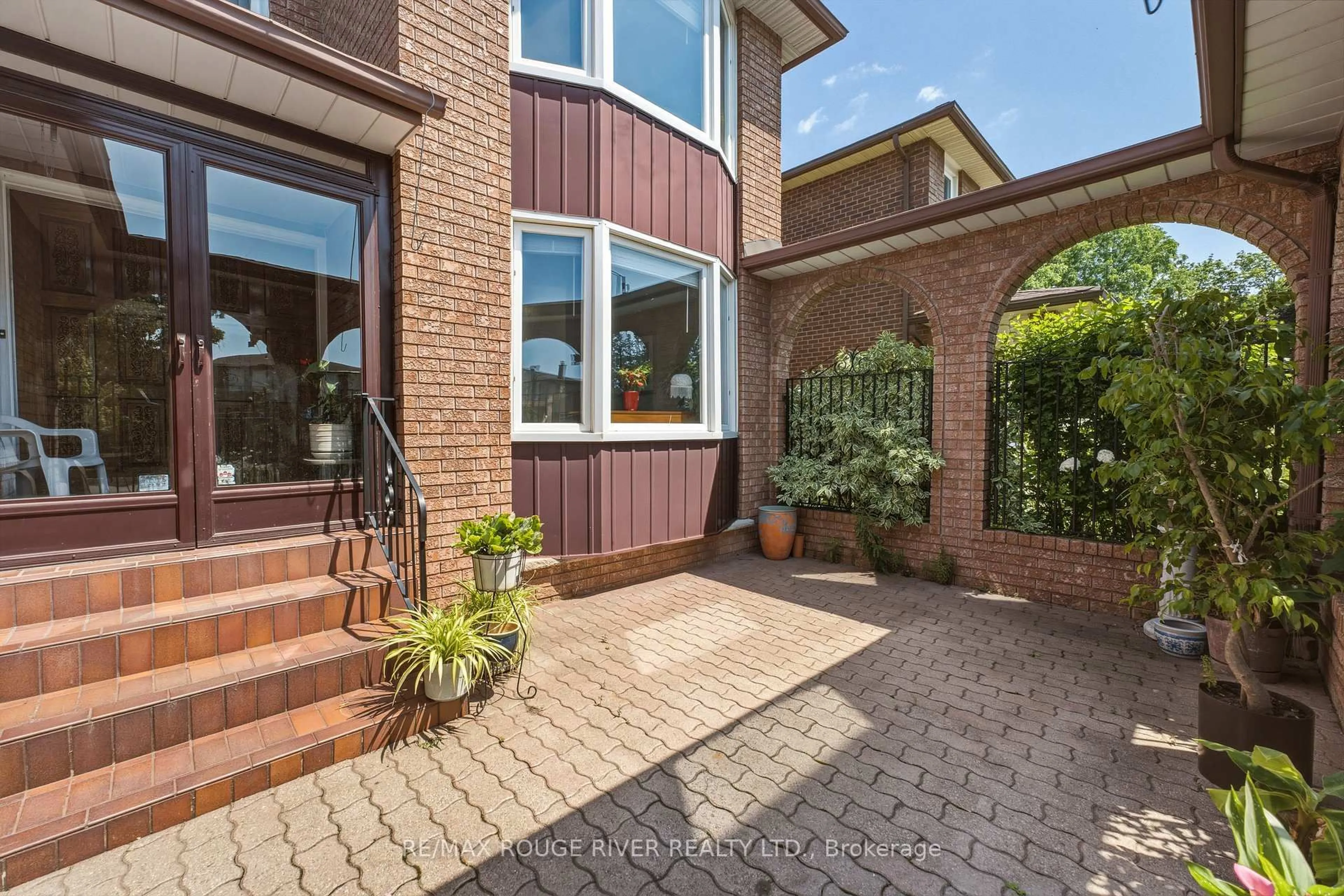 Home with brick exterior material, street for 51 Sugarbush Sq, Toronto Ontario M1C 3M6
