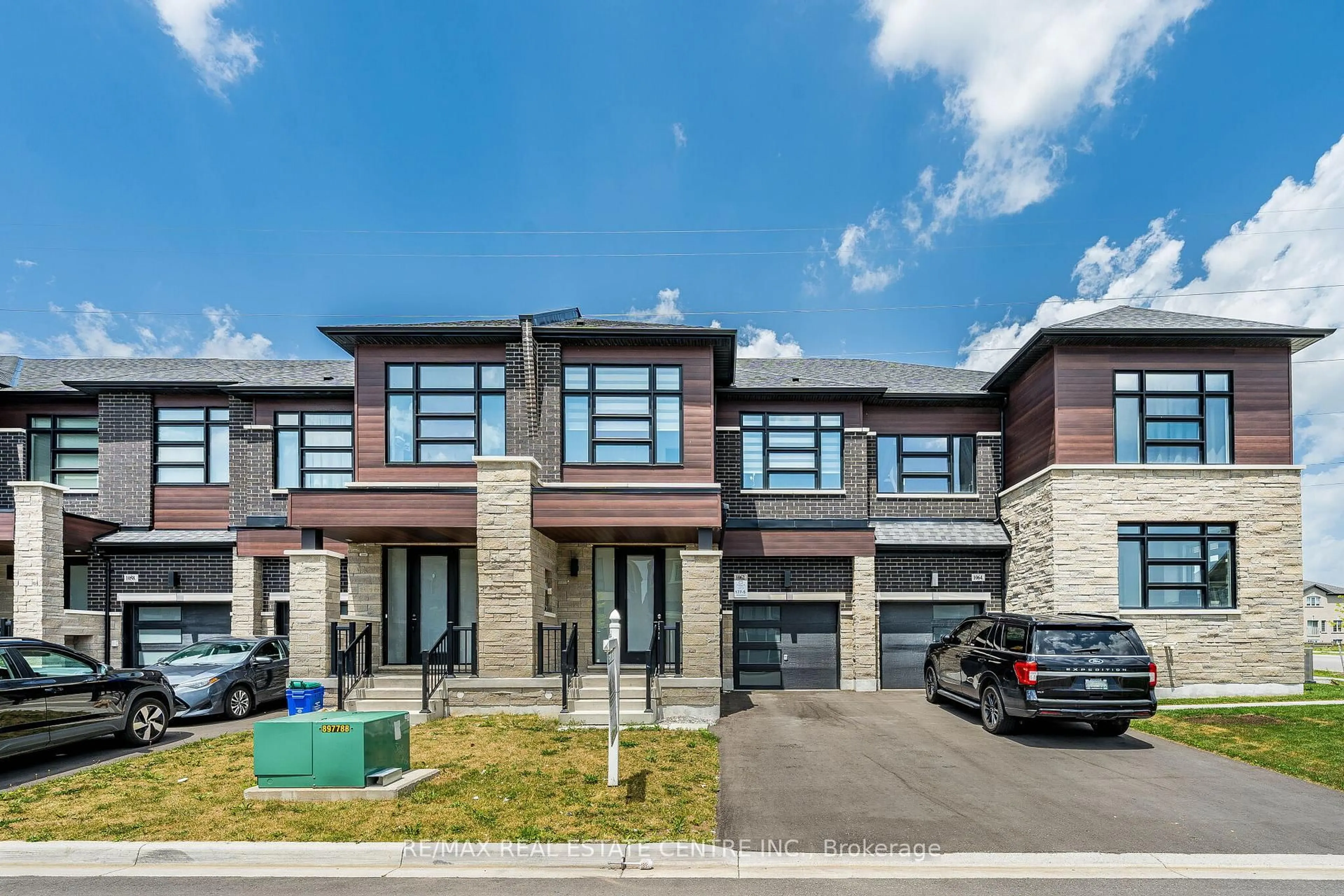 Home with brick exterior material, street for 1062 Skyridge Blvd, Pickering Ontario L1X 0G5