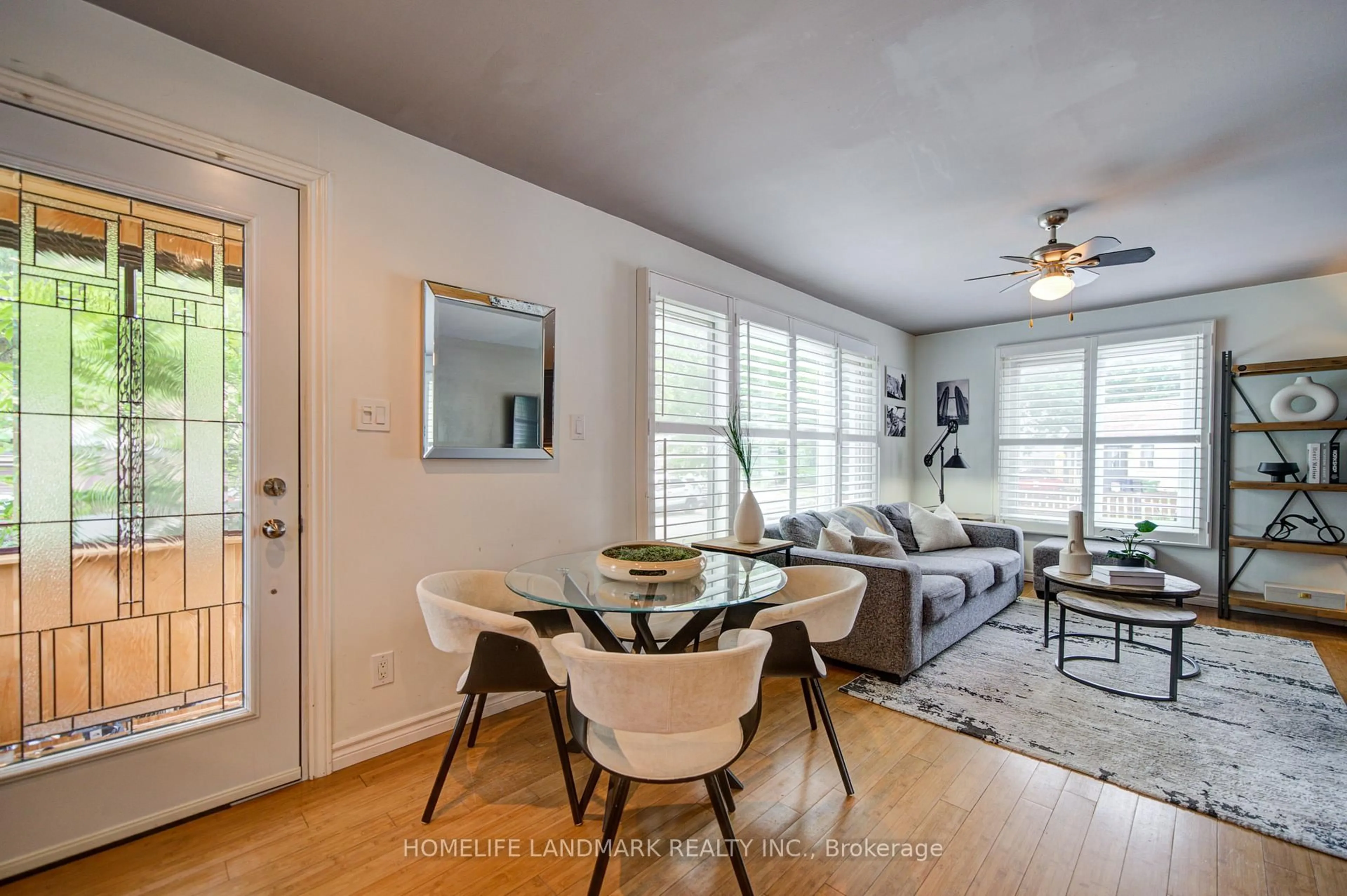 Living room with furniture, wood/laminate floor for 16 Warvet Cres, Toronto Ontario M4B 1P3