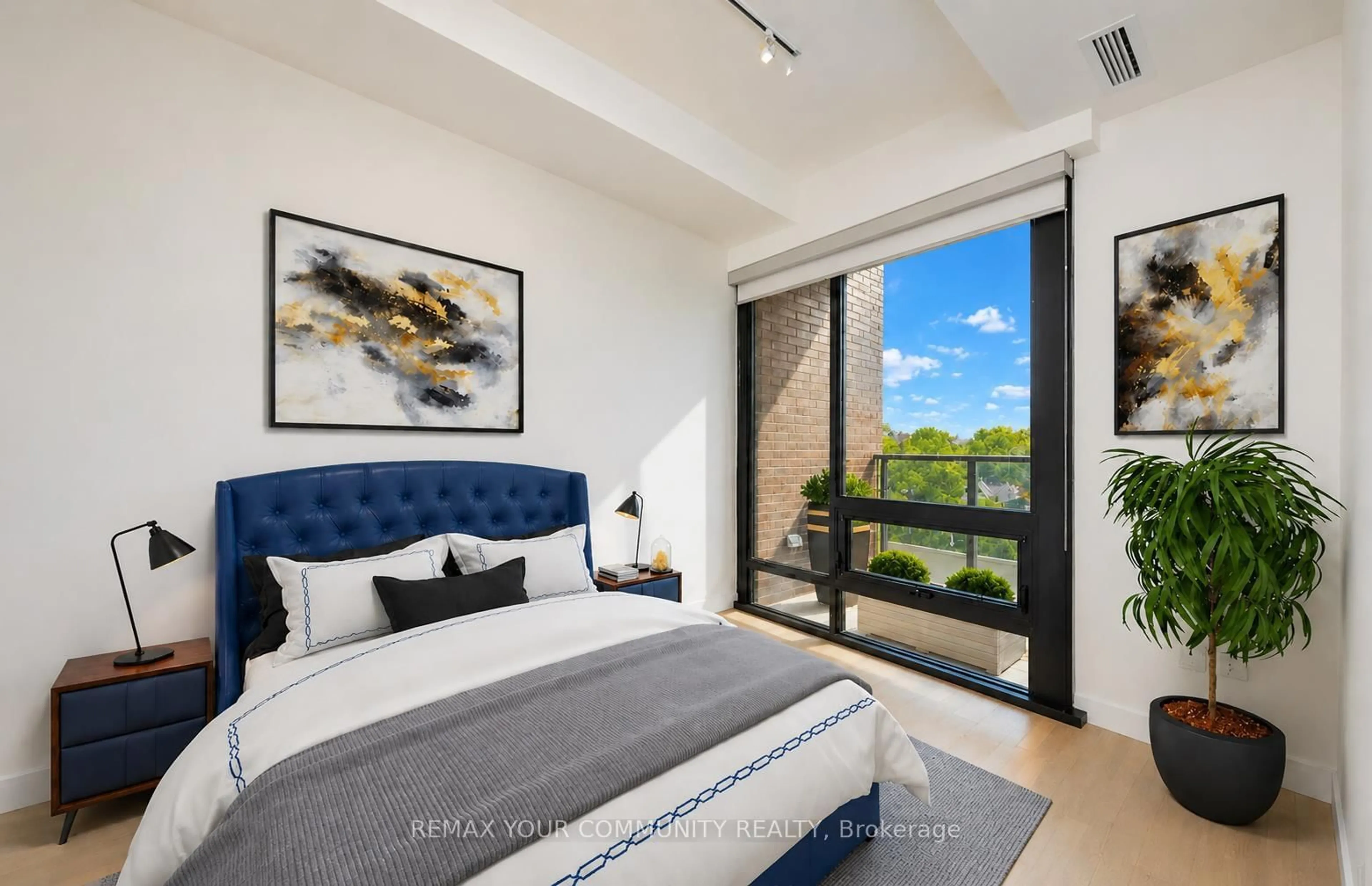 Bedroom with bed, unknown for 246 Logan Ave #503, Toronto Ontario M4M 1J2