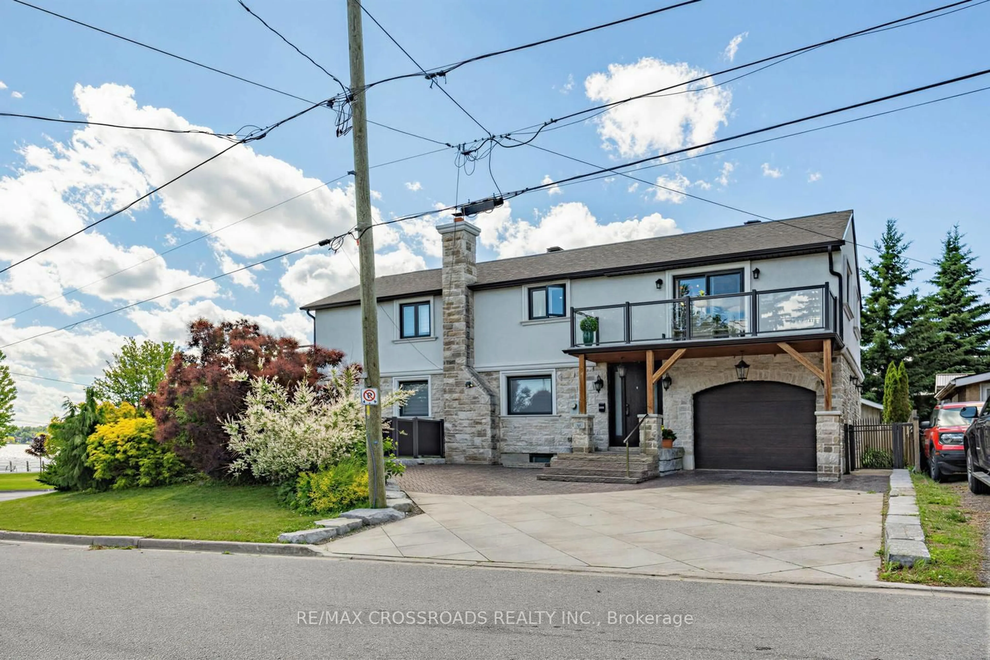 A pic from outside/outdoor area/front of a property/back of a property/a pic from drone, street for 661 Front Rd, Pickering Ontario L1W 1N9