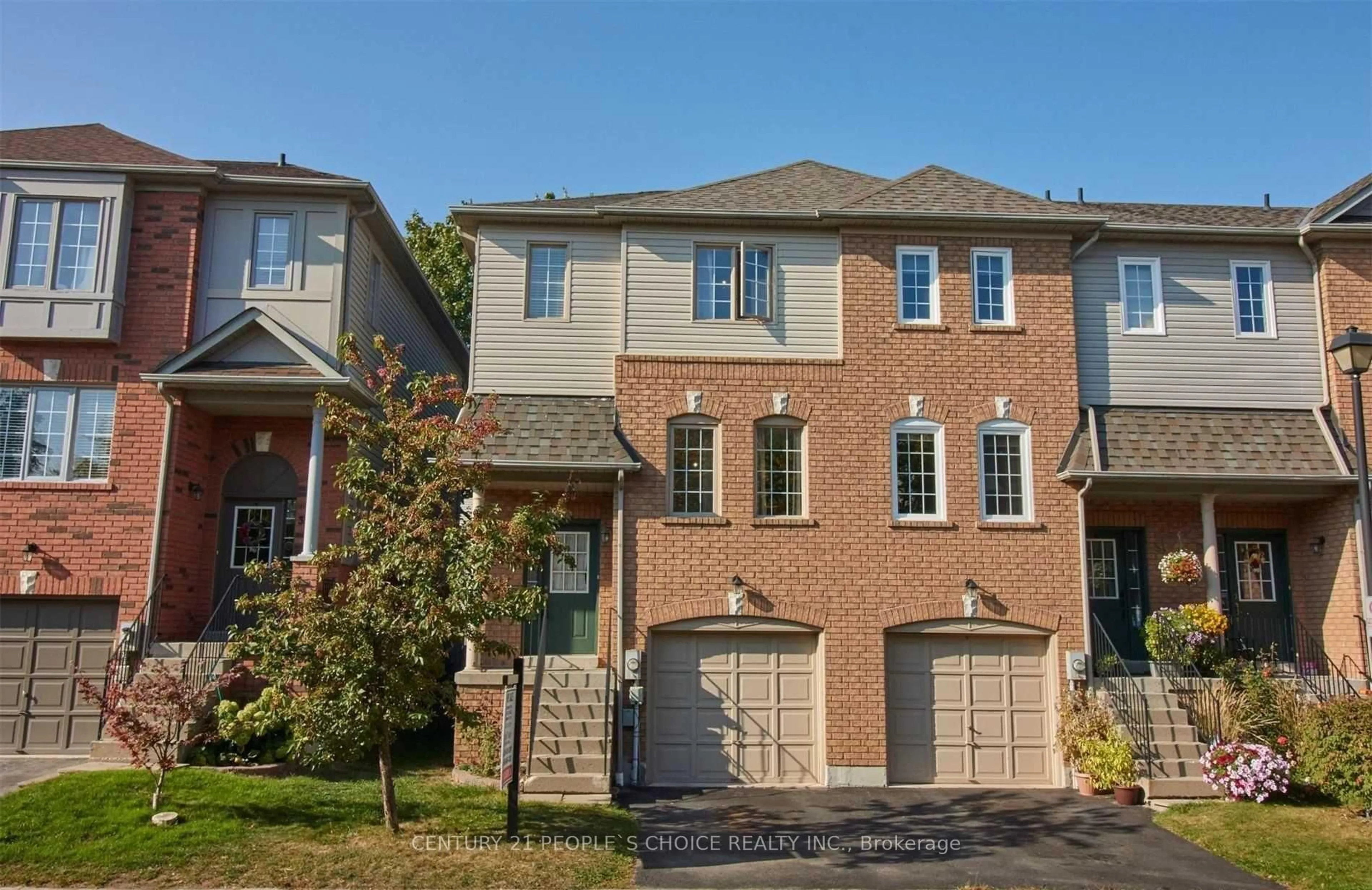 Home with brick exterior material, street for 33 Aspen Park Way #15, Whitby Ontario L1N 9M6