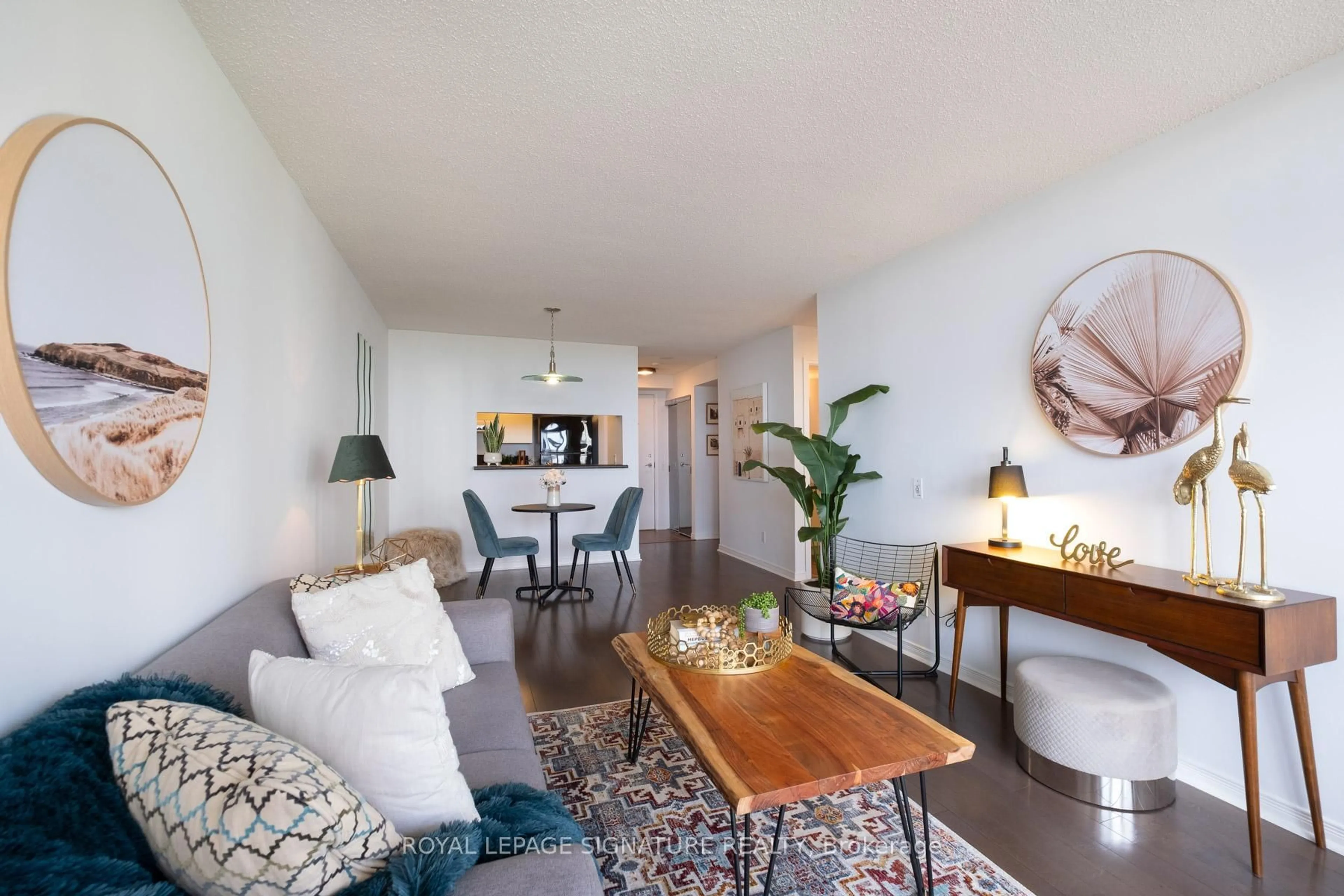 Living room with furniture, wood/laminate floor for 1200 The Esplanade Rd #810, Pickering Ontario L1V 6V3