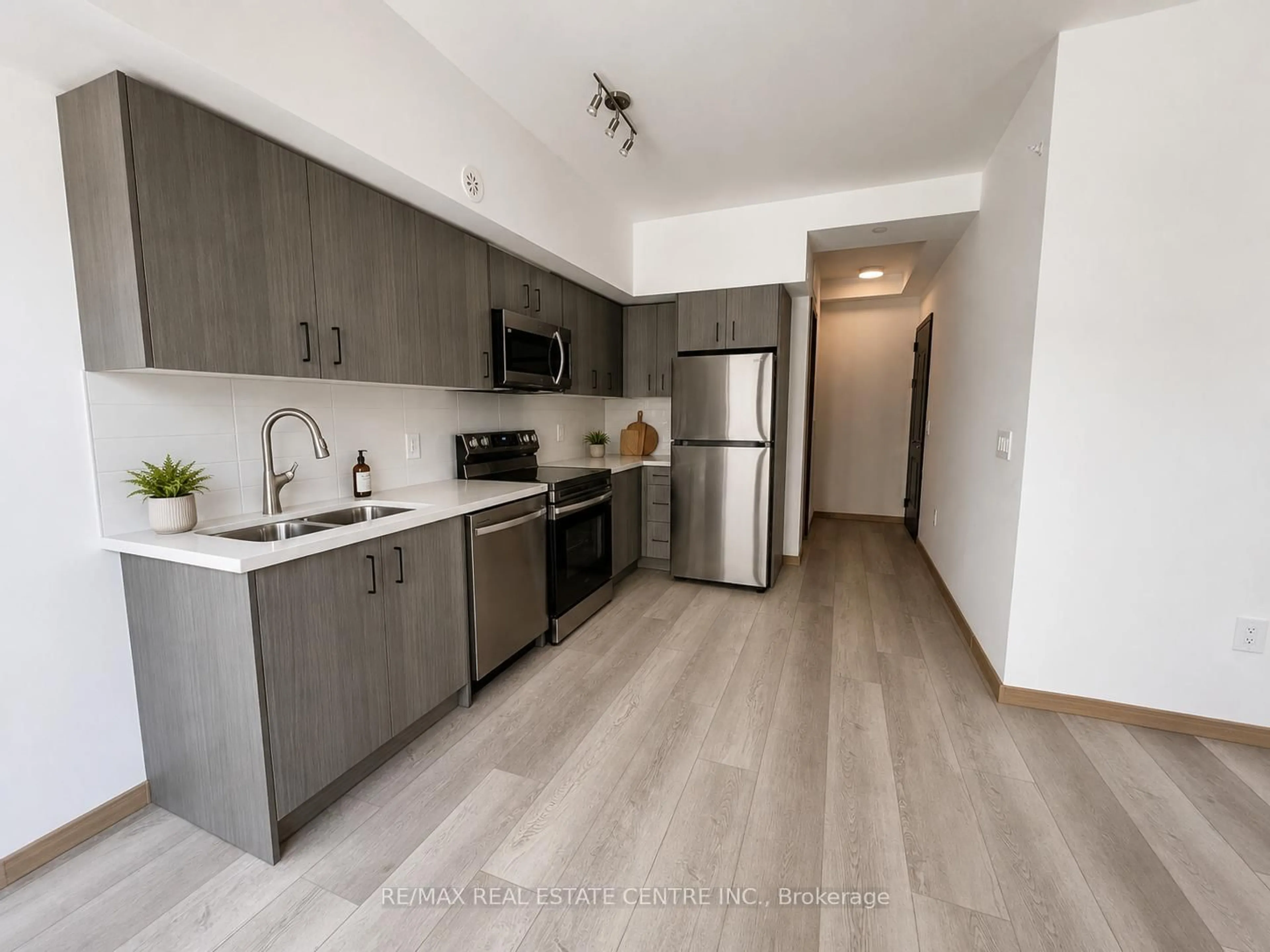Open concept kitchen, unknown for 3425 Sheppard Ave #307, Toronto Ontario M1T 3K5