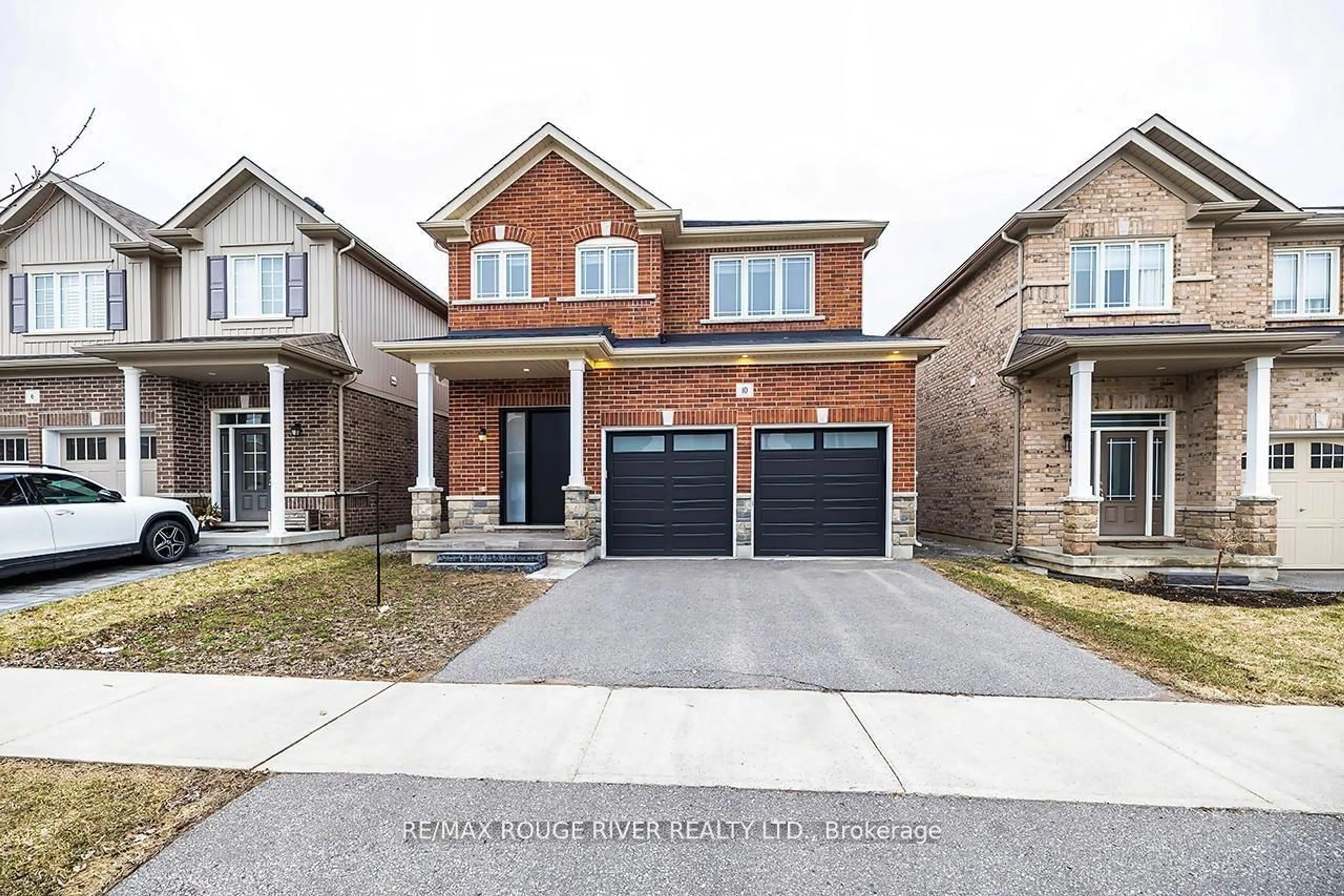 Home with brick exterior material, street for 10 Moses Cres, Clarington Ontario L1C 0T7