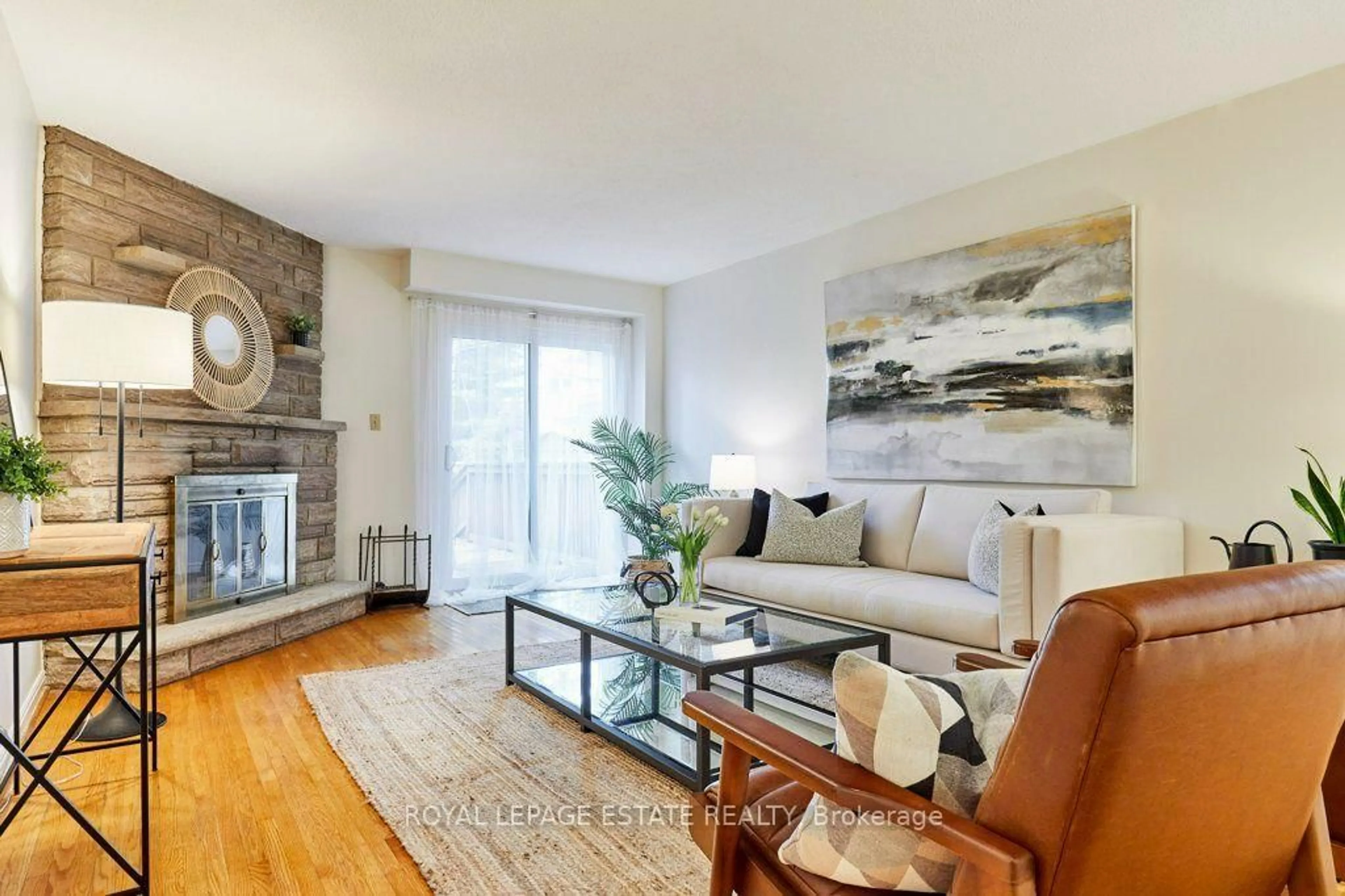 Living room with furniture, wood/laminate floor for 20 Pine Ave, Toronto Ontario M4E 1L8