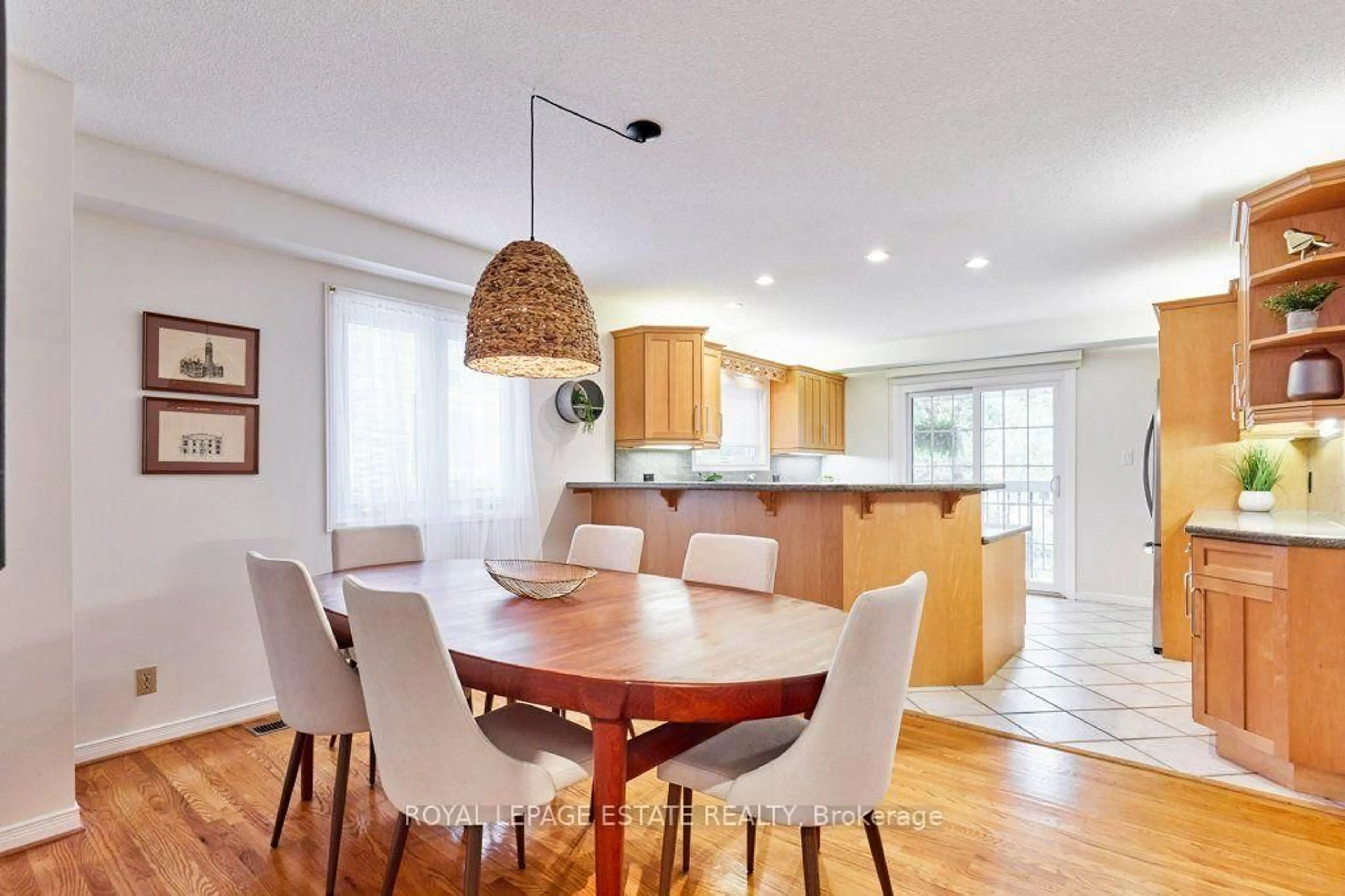 Open concept kitchen, wood/laminate floor for 20 Pine Ave, Toronto Ontario M4E 1L8