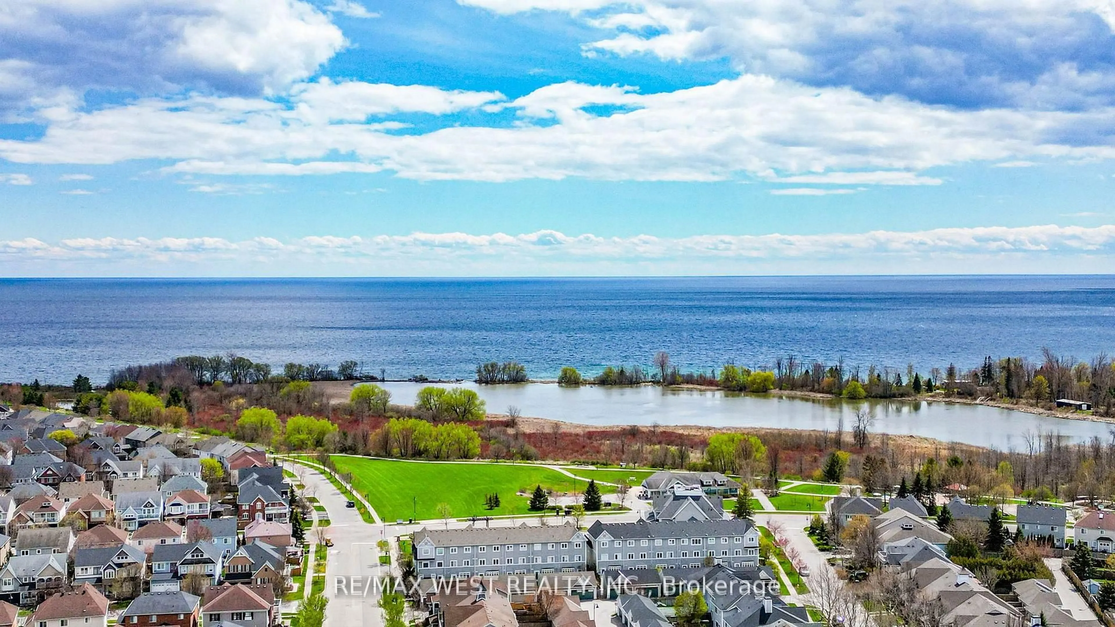 A pic from outside/outdoor area/front of a property/back of a property/a pic from drone, water/lake/river/ocean view for 112 Handley Cres, Ajax Ontario L1Z 1L7