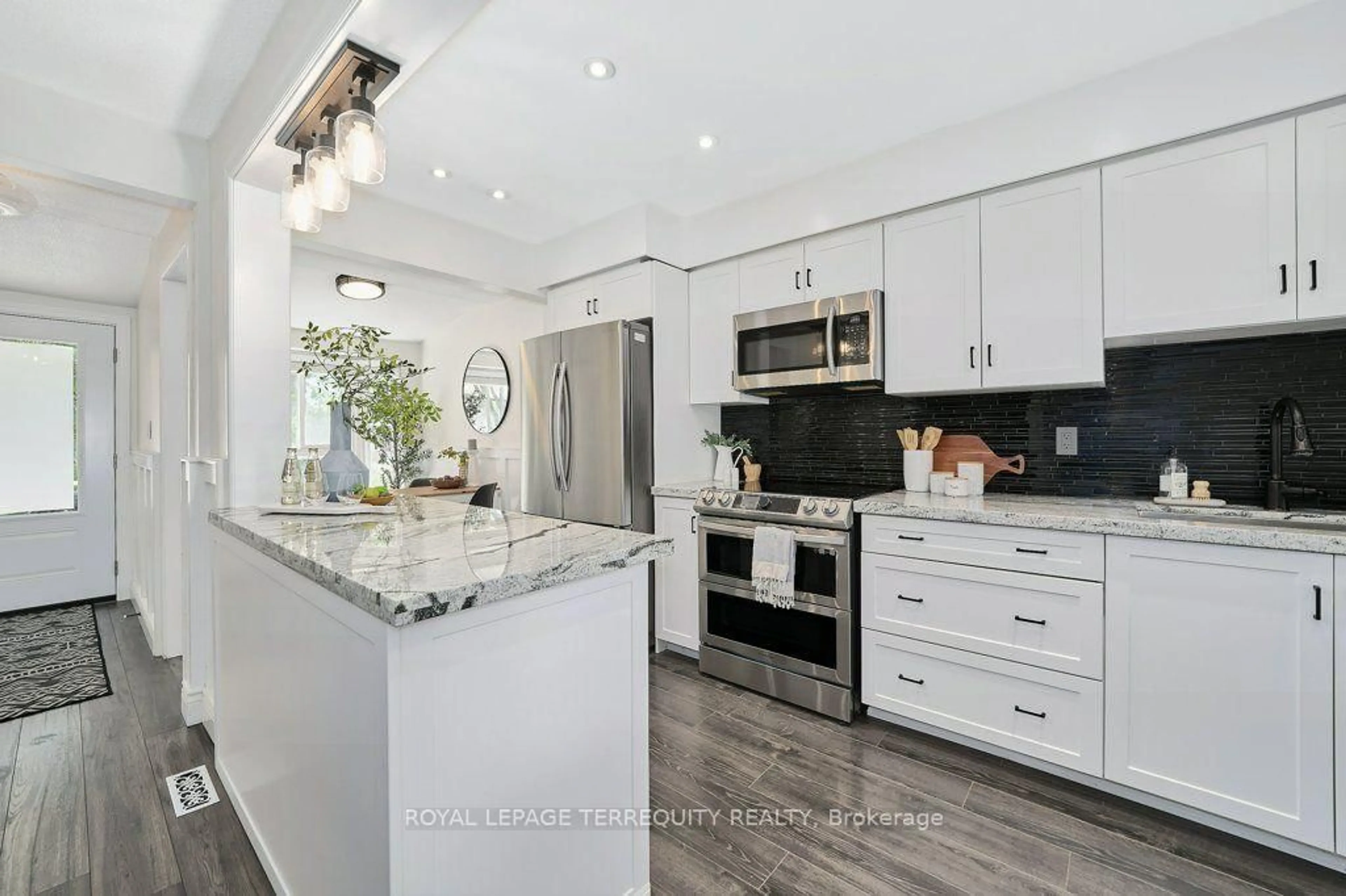 Open concept kitchen, ceramic/tile floor for 57 Renfield Cres, Whitby Ontario L1P 1B2