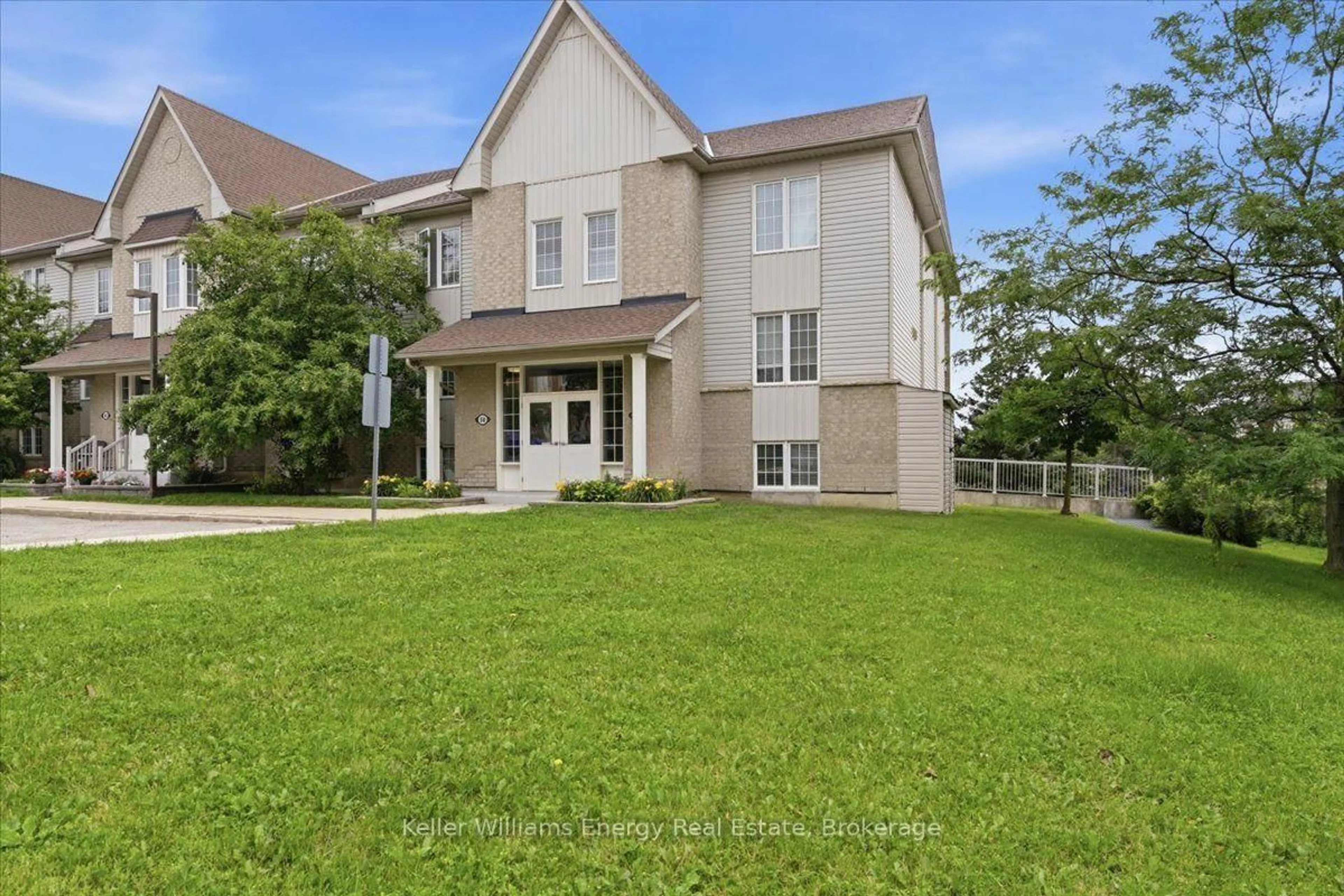 A pic from outside/outdoor area/front of a property/back of a property/a pic from drone, unknown for 56 Petra Way #1, Whitby Ontario L1R 0A4