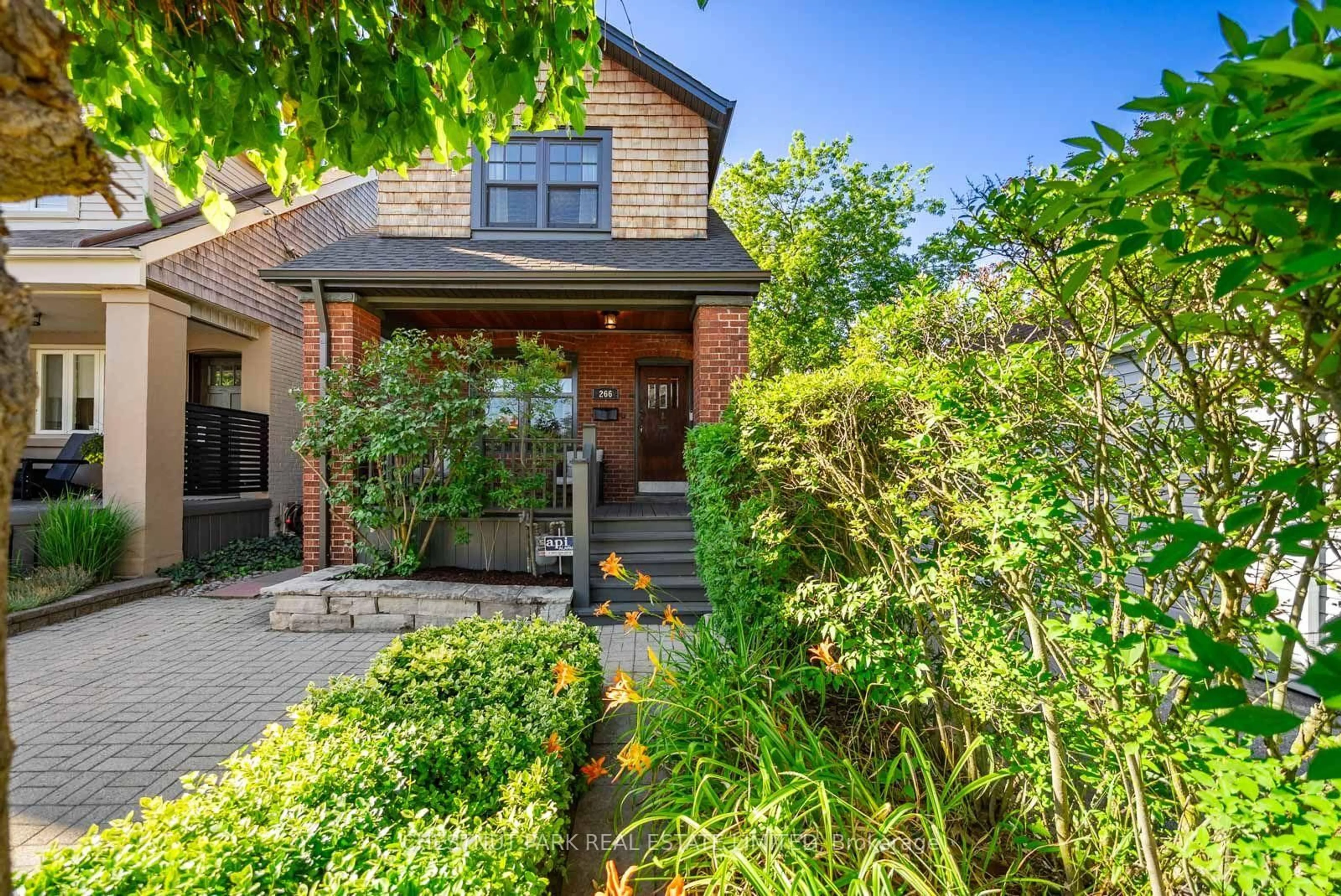 Home with brick exterior material, street for 266 Queensdale Ave, Toronto Ontario M4C 2B2