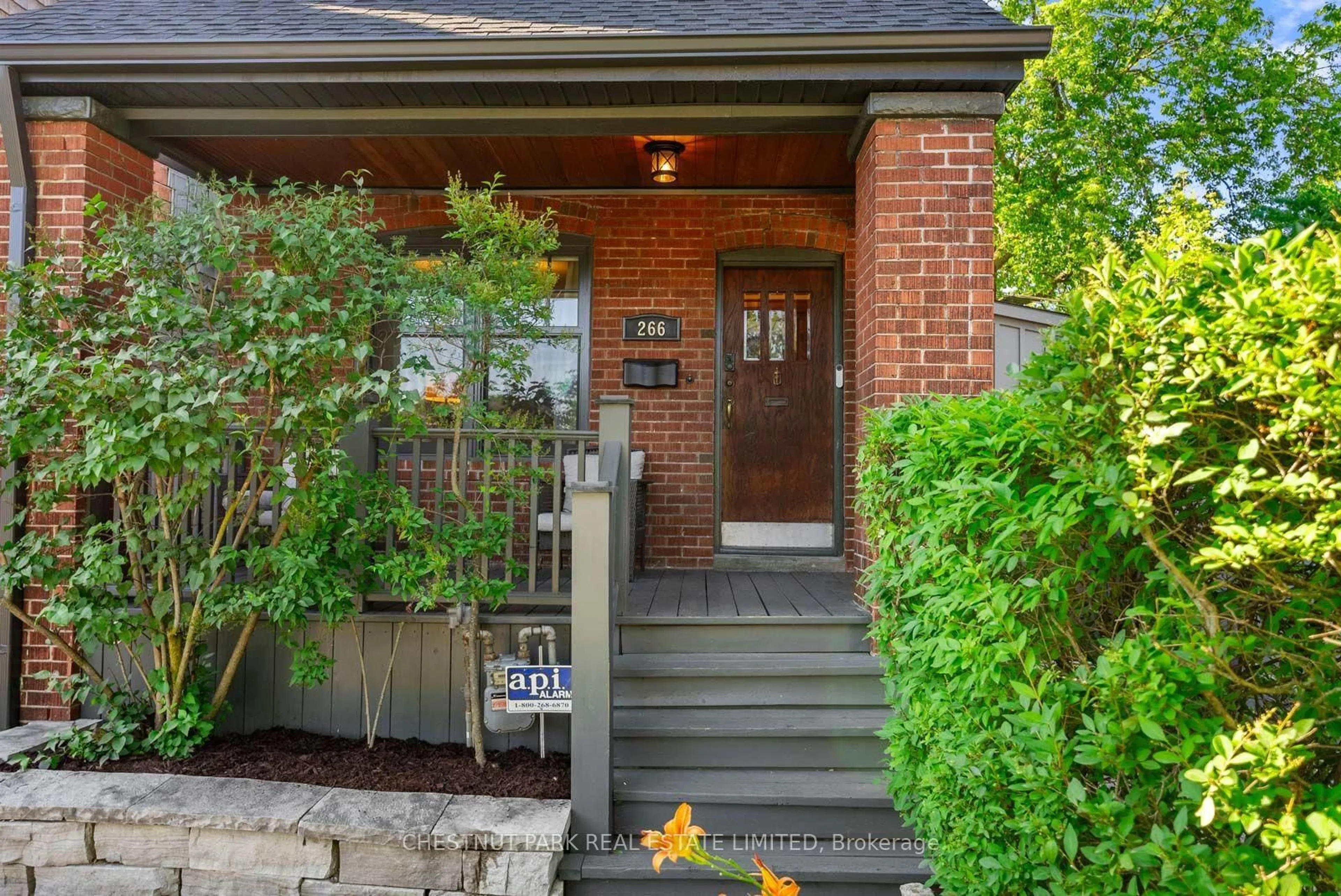 Home with brick exterior material, street for 266 Queensdale Ave, Toronto Ontario M4C 2B2