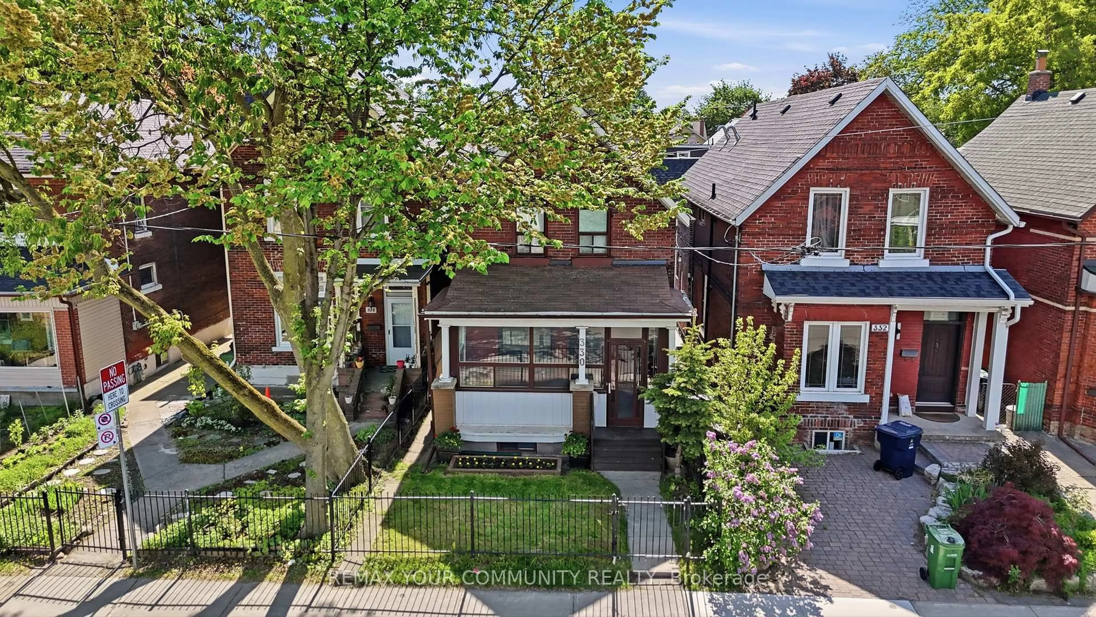 A pic from outside/outdoor area/front of a property/back of a property/a pic from drone, street for 330 Main St, Toronto Ontario M4C 4X7