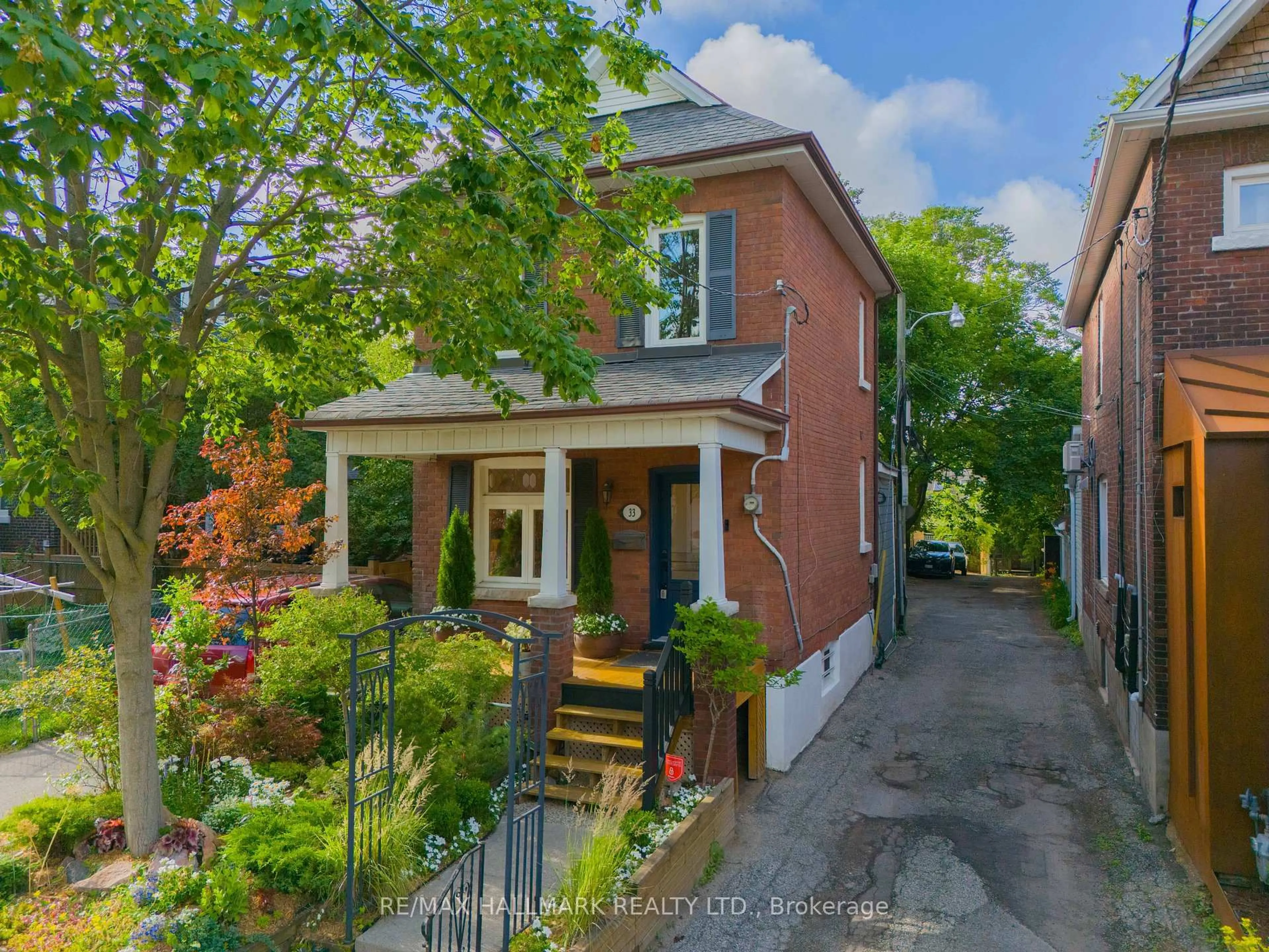 Home with brick exterior material, street for 33 Frizzell Ave, Toronto Ontario M4K 1H8