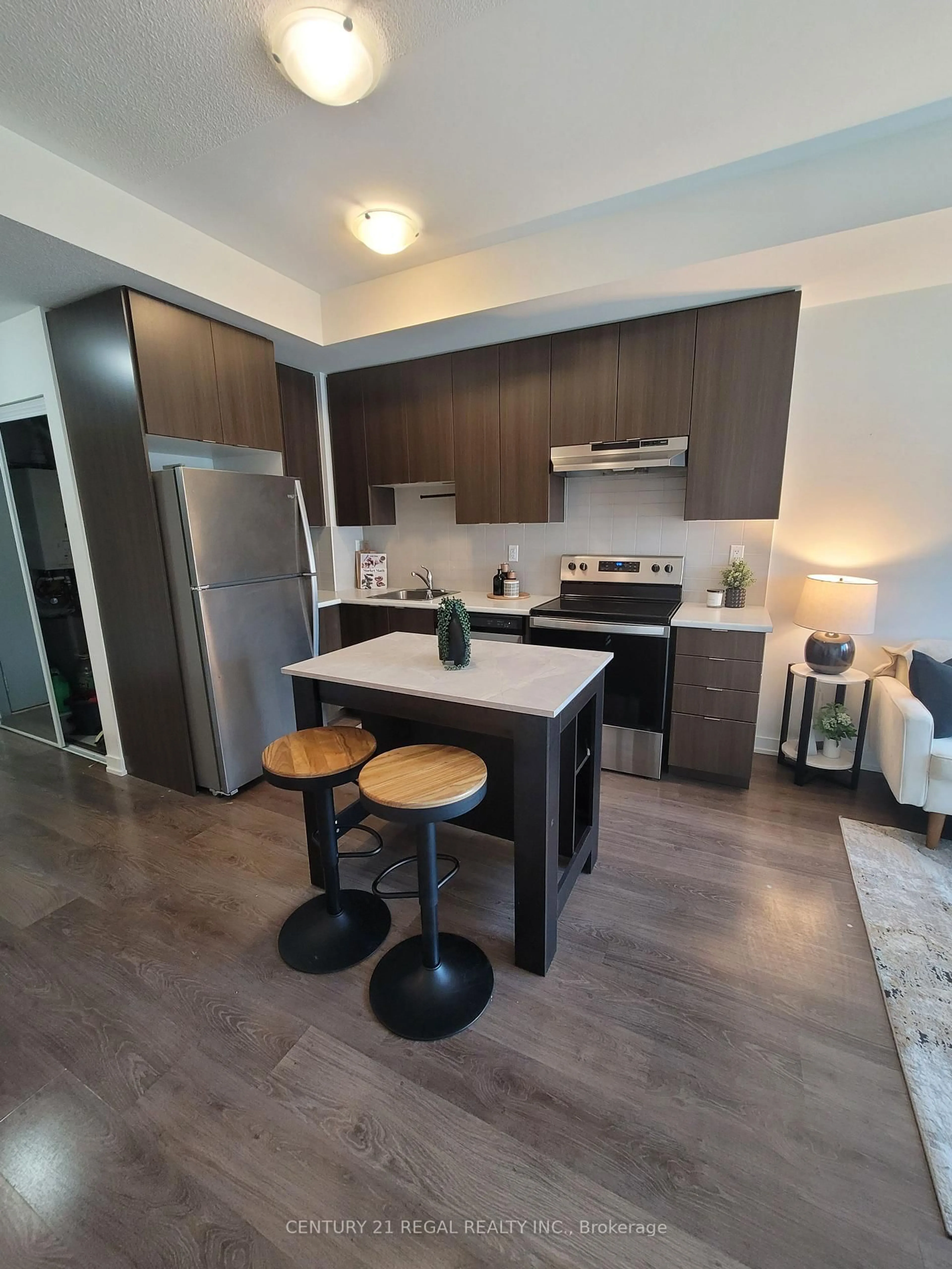 Open concept kitchen, wood/laminate floor for 5131 Sheppard Ave #301, Toronto Ontario M1B 0C9