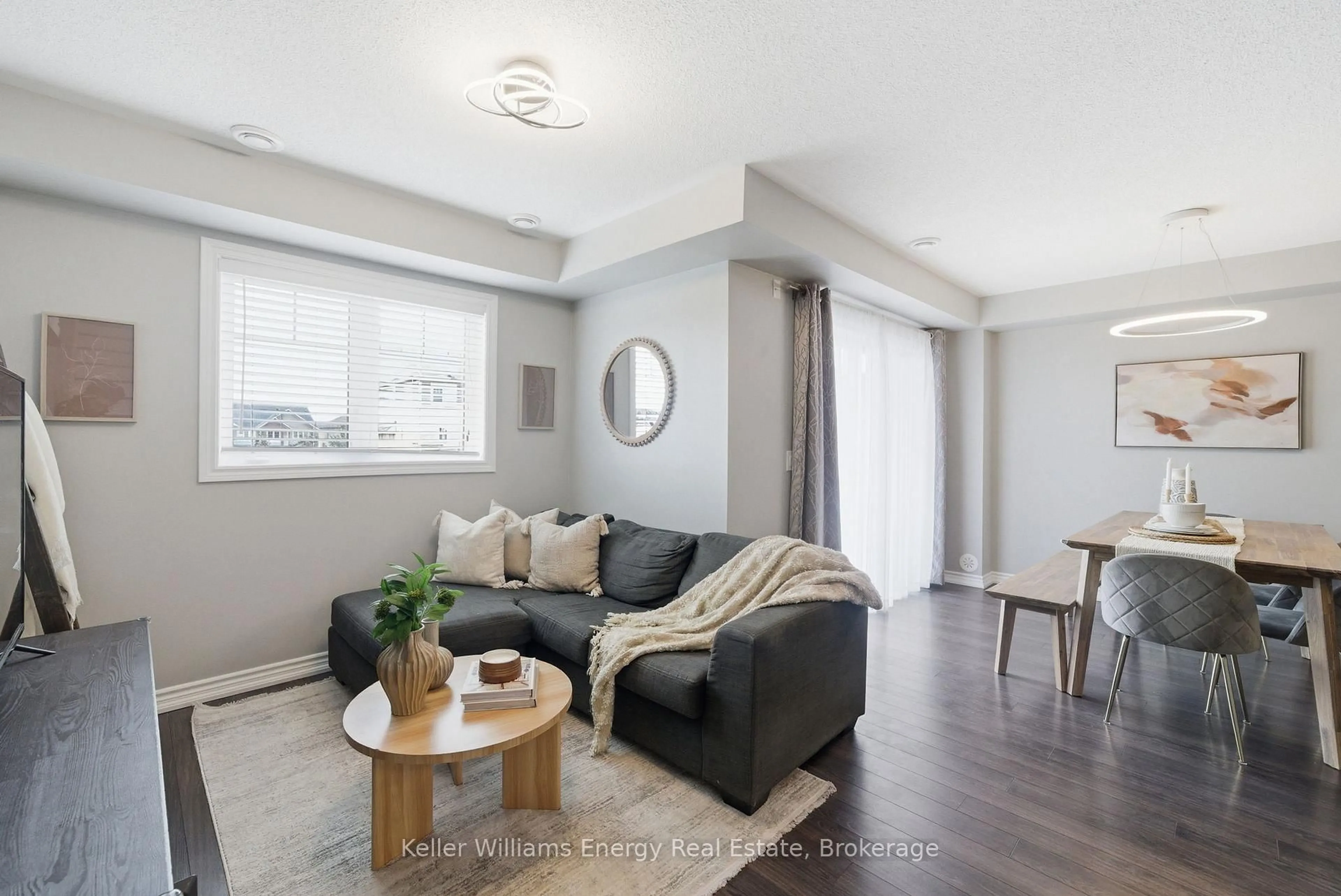 Living room with furniture, wood/laminate floor for 98 Tabaret Cres, Oshawa Ontario L1L 0G5