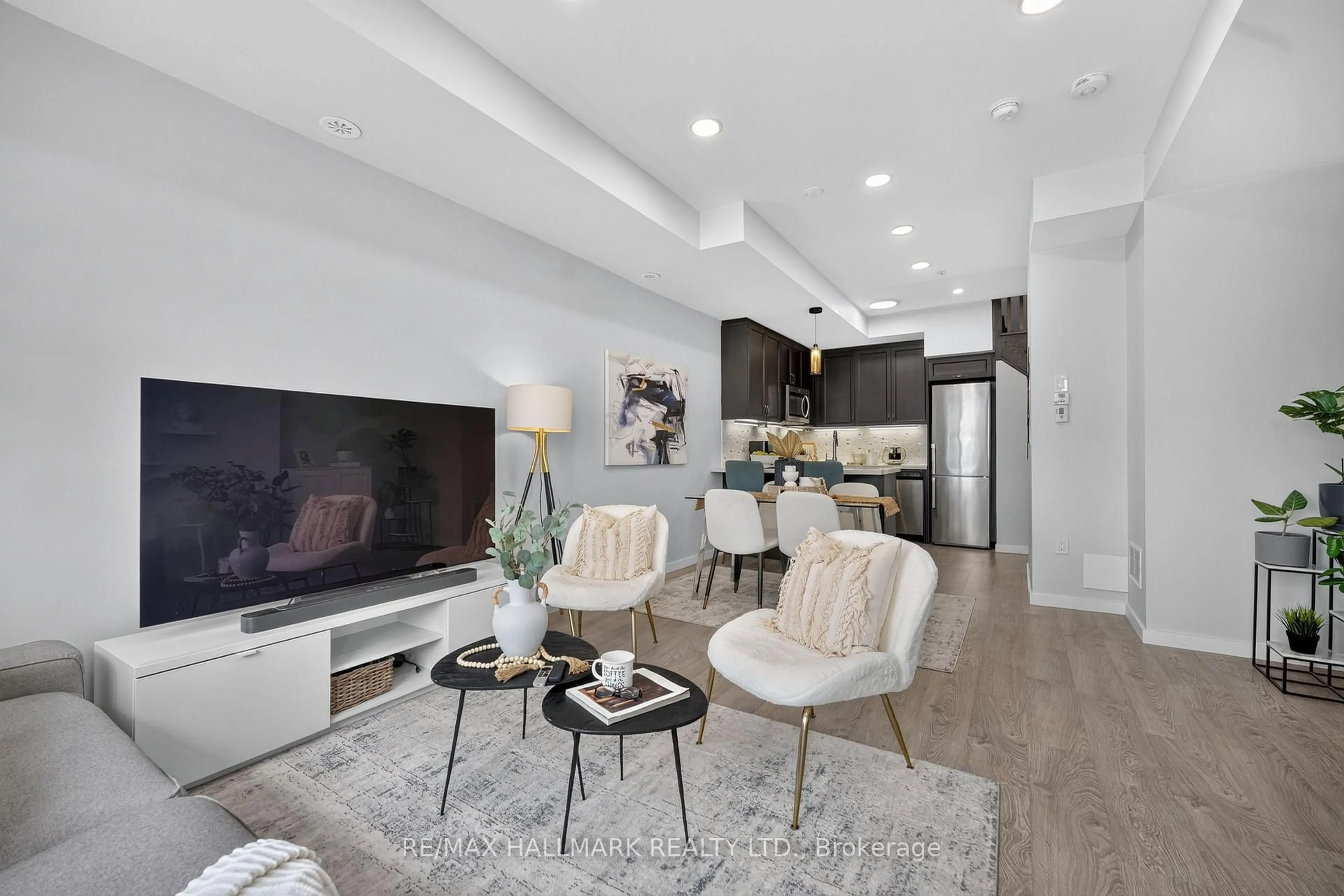 Living room with furniture, unknown for 1711 Pure Springs Blvd #508, Pickering Ontario L1X 0E3