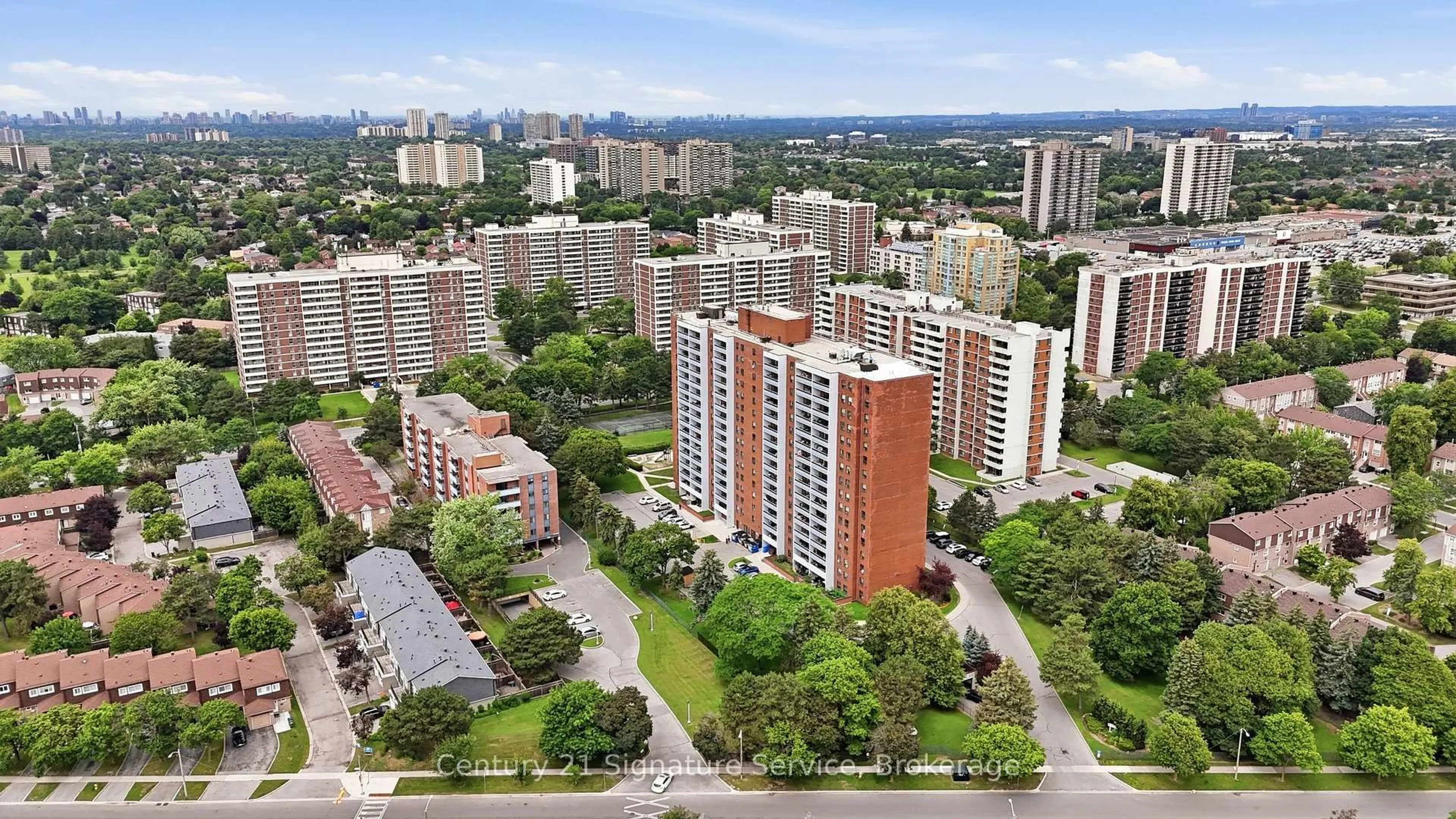 A pic from outside/outdoor area/front of a property/back of a property/a pic from drone, city buildings view from balcony for 1250 Bridletowne Circ #610, Toronto Ontario M1W 2V1