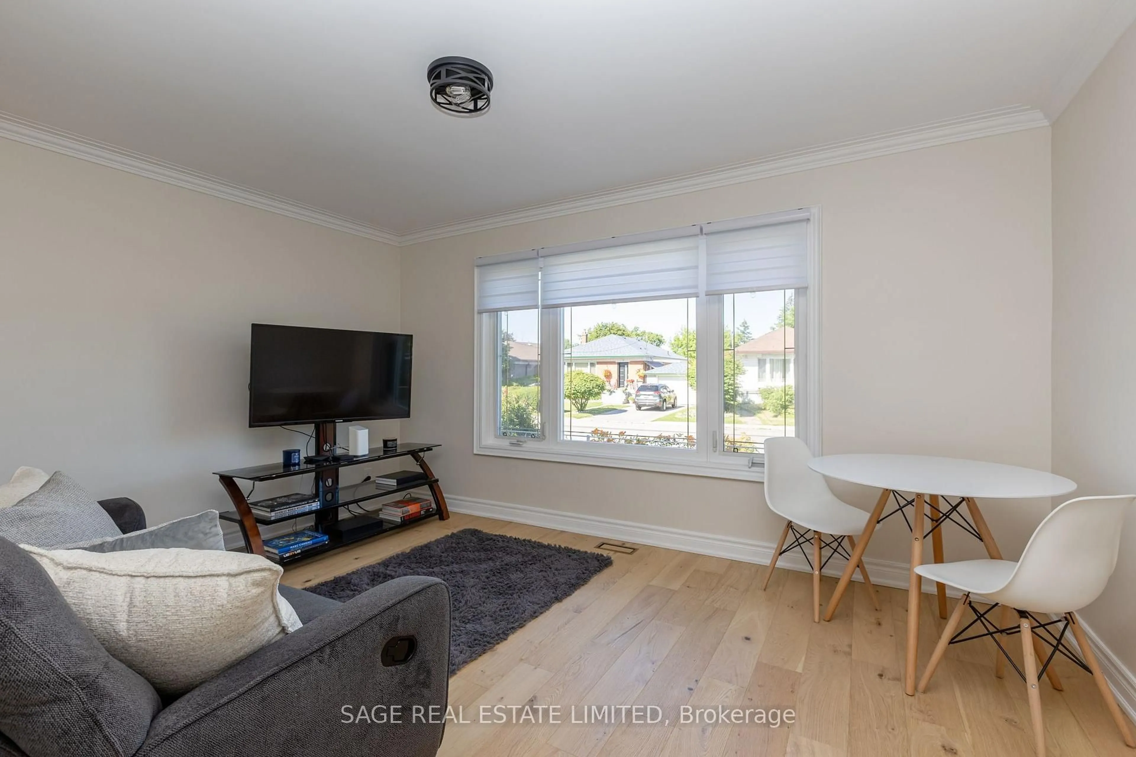 Living room with furniture, wood/laminate floor for 8 Lombardy Cres, Toronto Ontario M1K 4N8