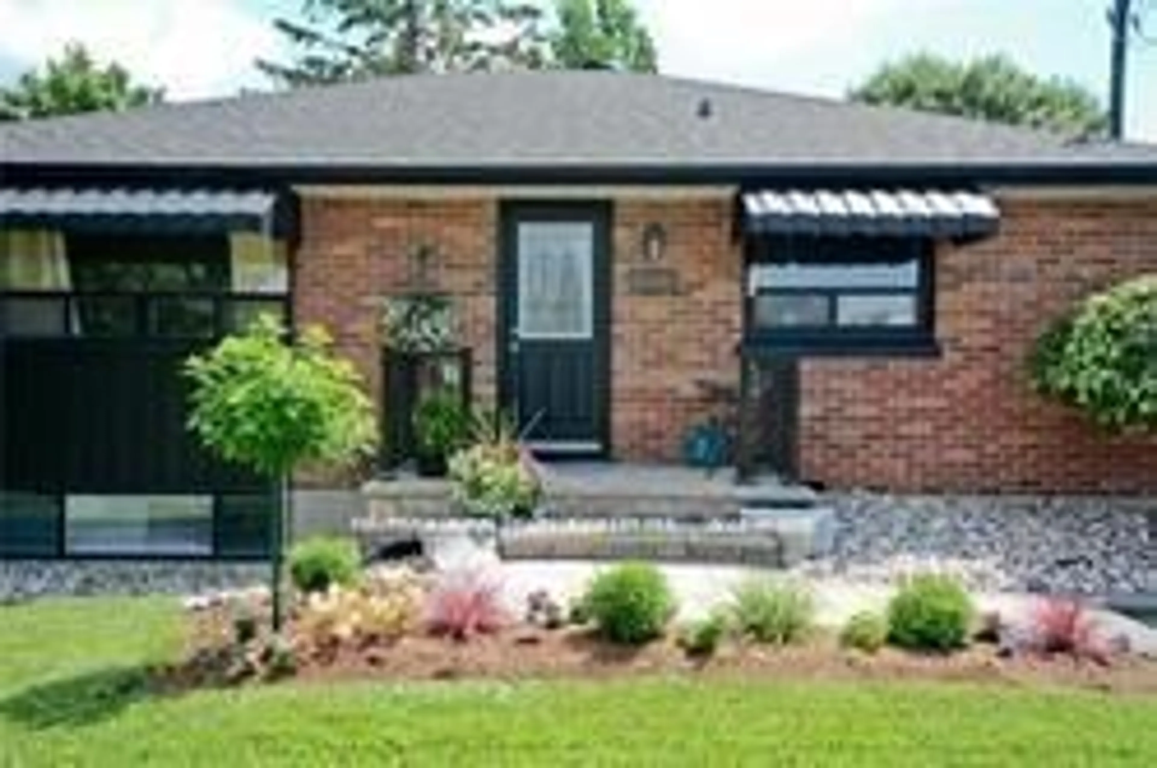 Home with brick exterior material, street for 607 Stevenson Rd, Oshawa Ontario L1J 5P2