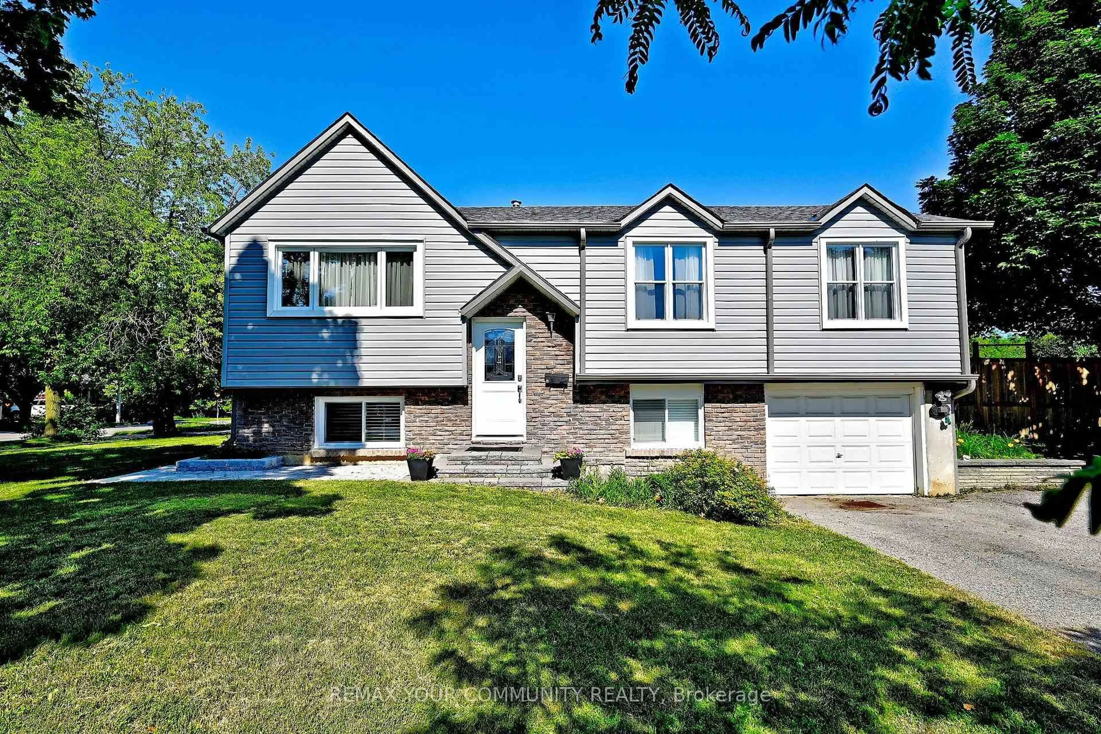 Home with vinyl exterior material, street for 18 Harland Cres, Ajax Ontario L1S 1J8