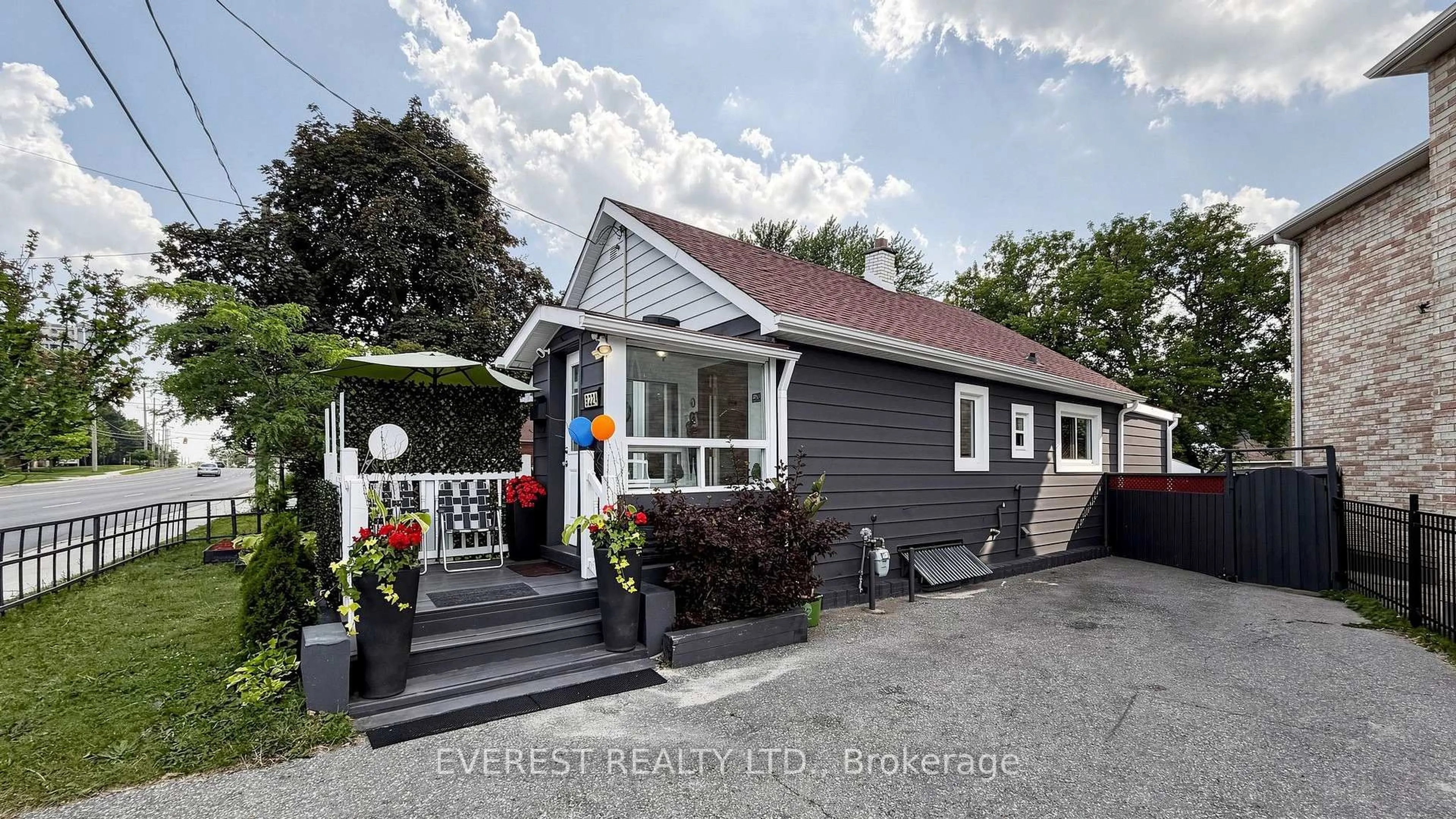 Home with vinyl exterior material, street for 922A Danforth Rd, Toronto Ontario M1K 1H9