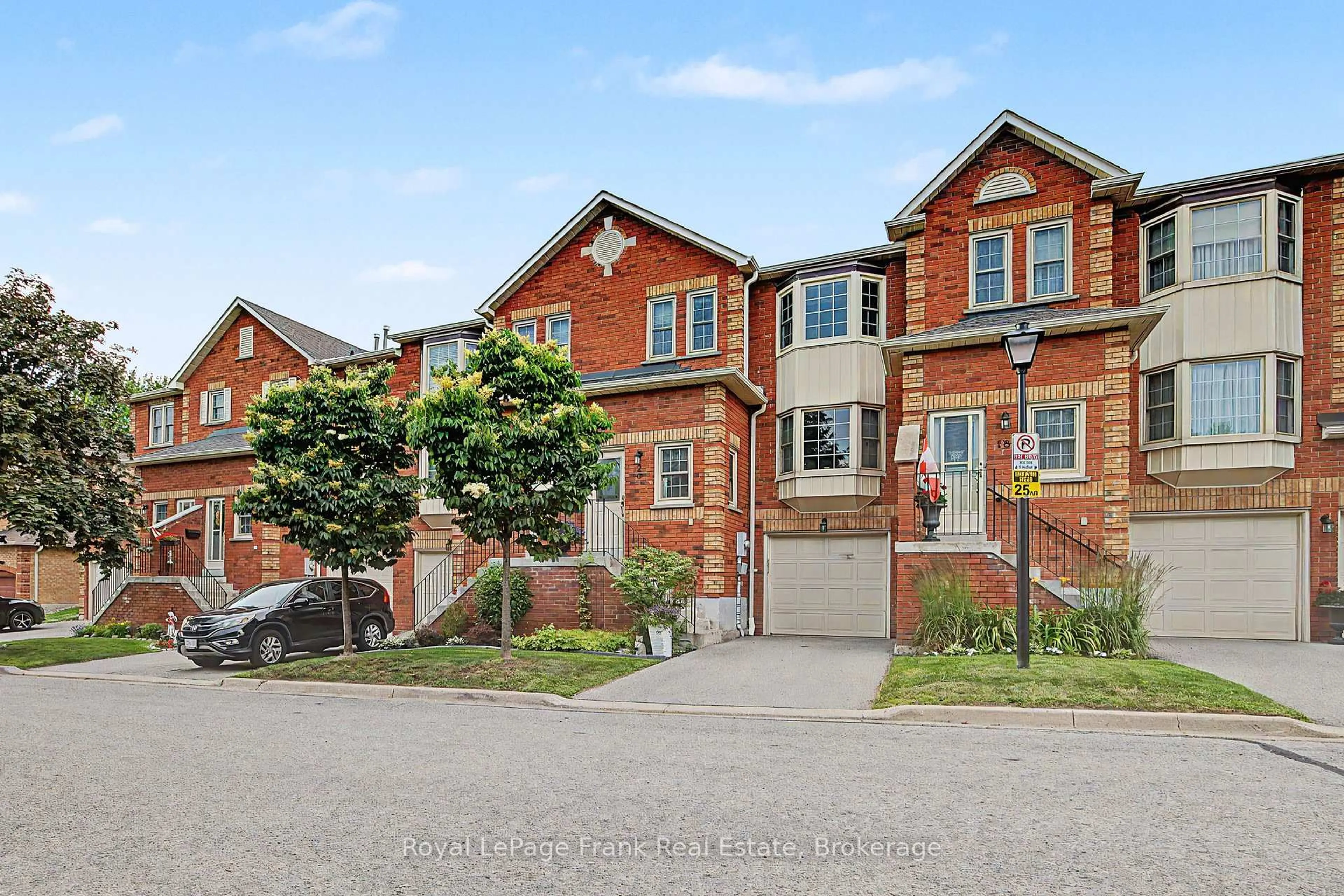 Home with brick exterior material, street for 1610 CRAWFORTH St #20, Whitby Ontario L1N 9B1
