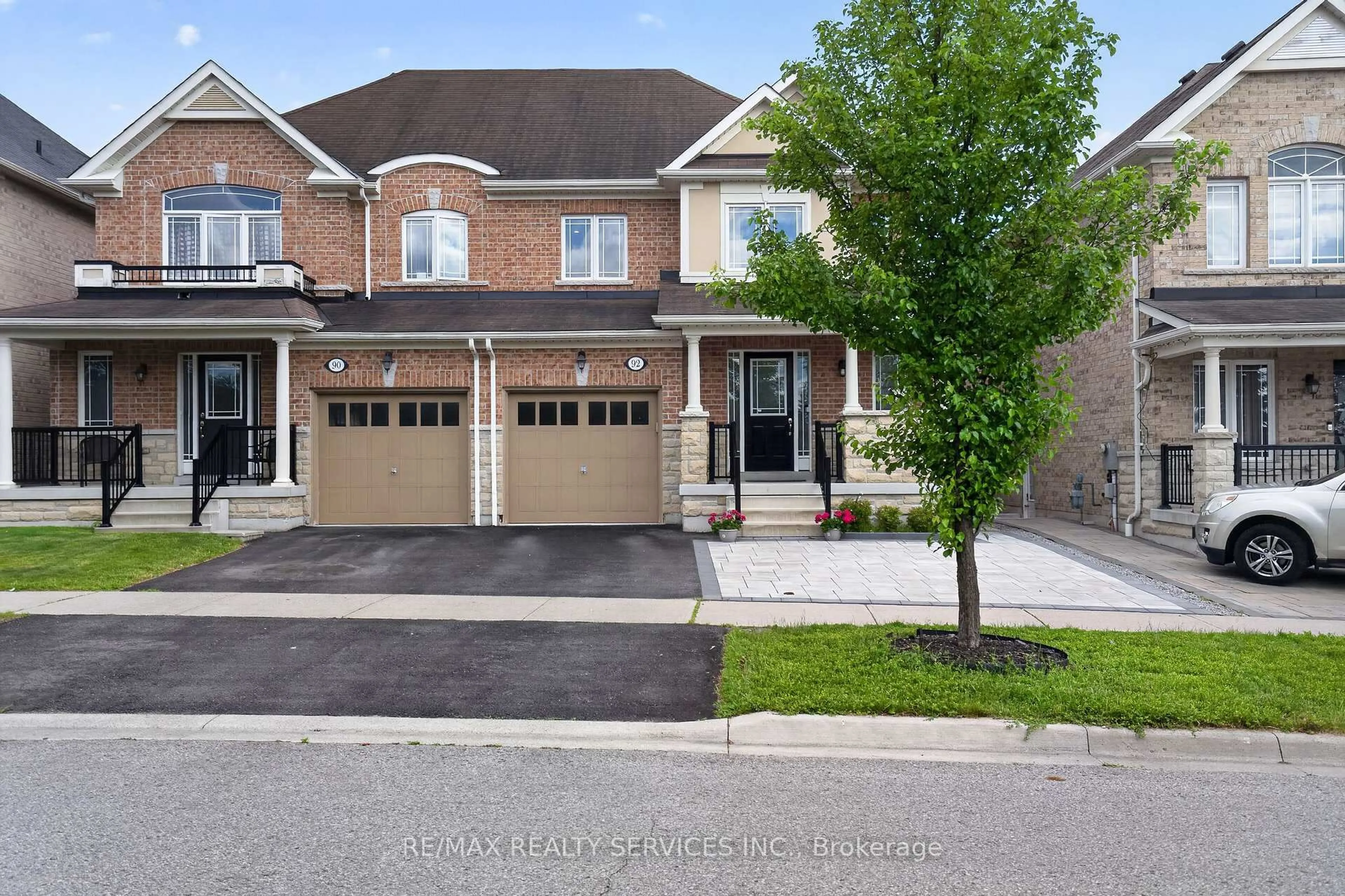 Home with brick exterior material, street for 92 Snowling Dr, Ajax Ontario L1Z 0G1