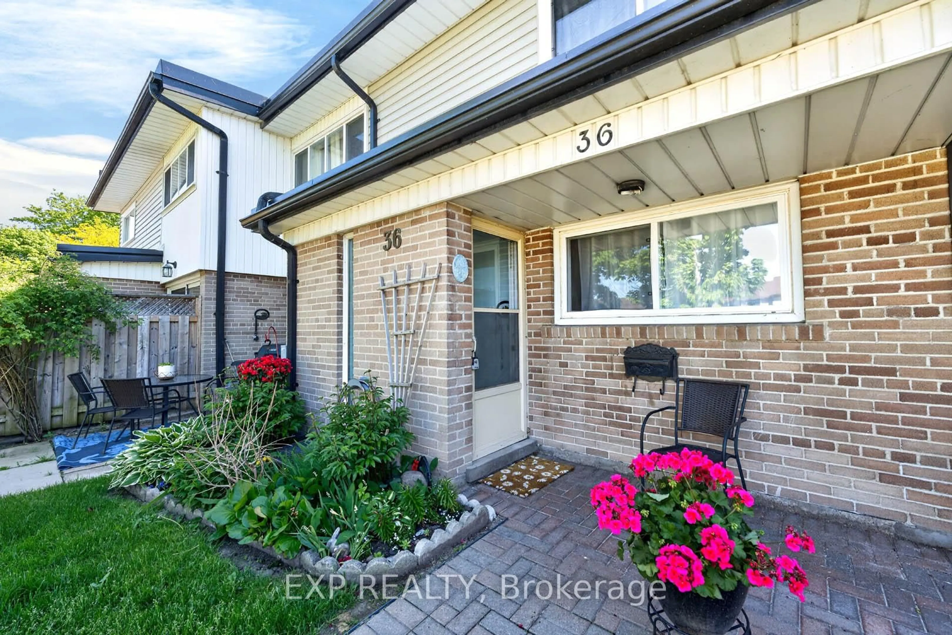 Home with brick exterior material, street for 925 Bayly St #36, Pickering Ontario L1W 1L4