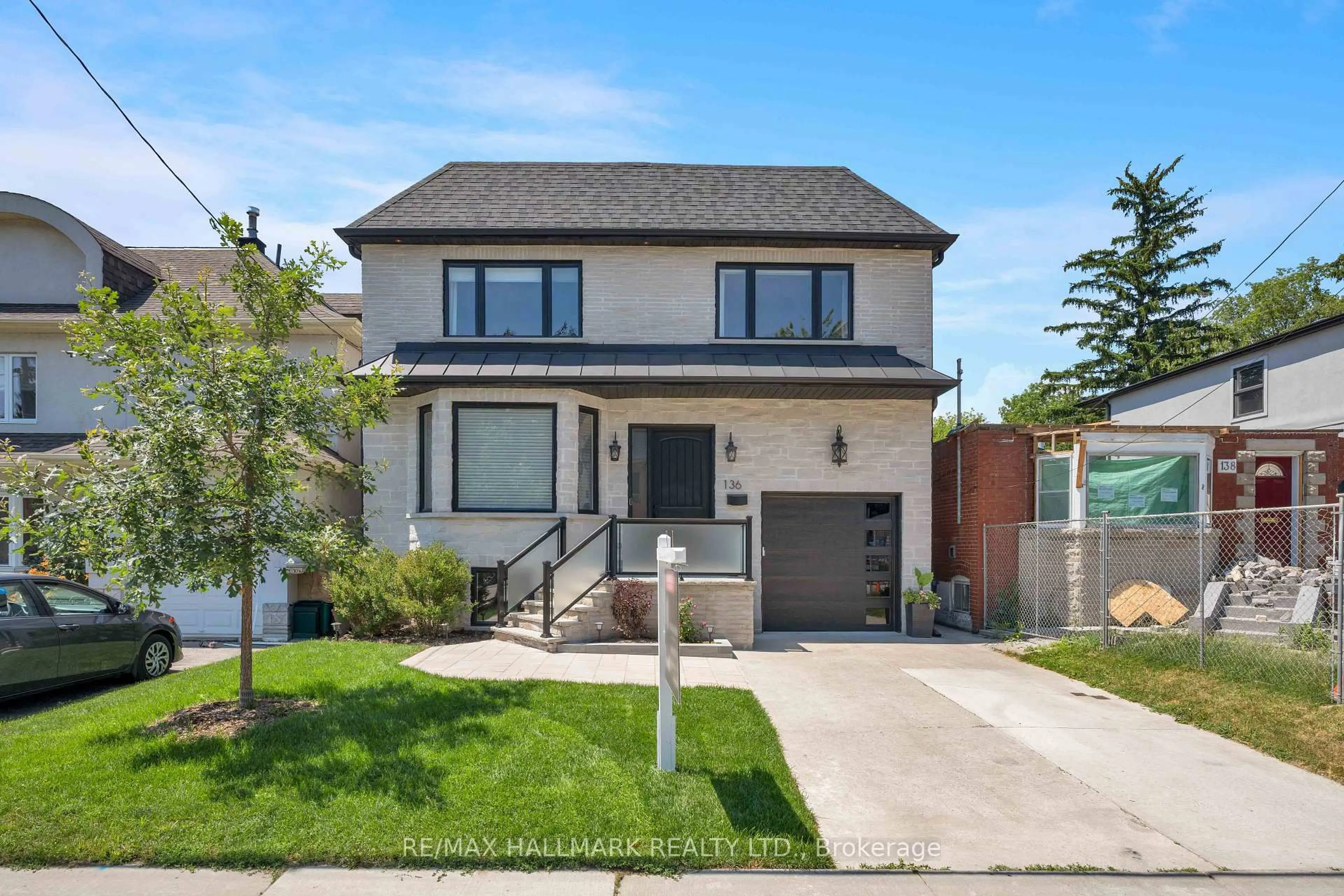 Home with brick exterior material, street for 136 Glenwood Cres, Toronto Ontario M4B 1K2